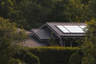 A house with a solar panel on the roof