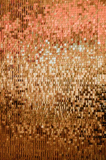 A close up of a wall with a pattern on it