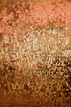 A close up of a wall with a pattern on it