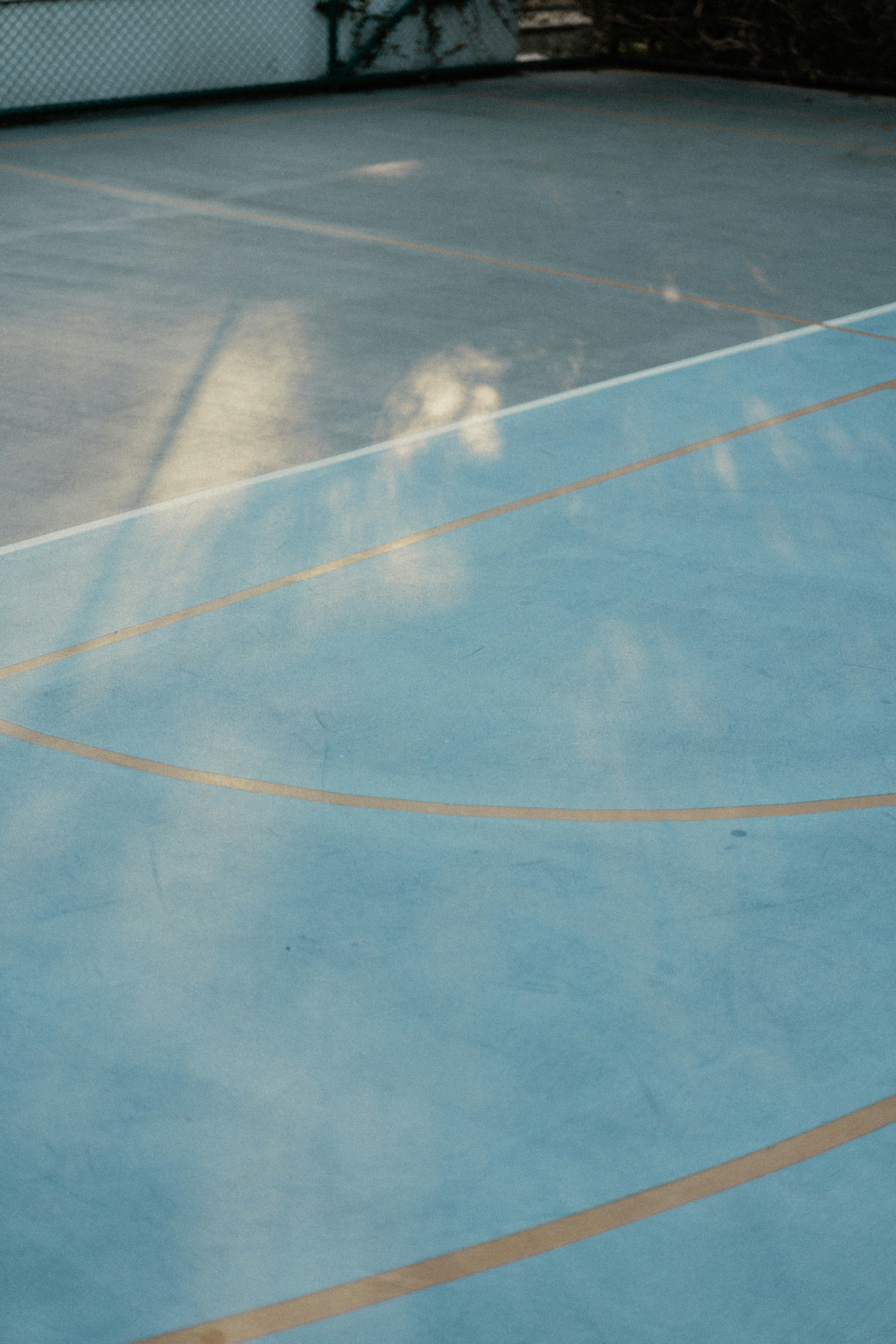 A person on a court with a tennis racket