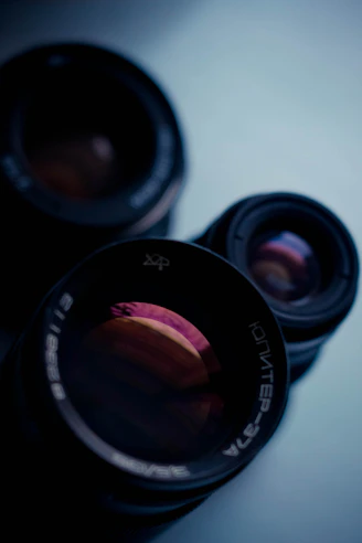 A close up of a camera lens on a table