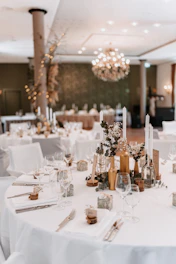 A banquet room set up for a formal function