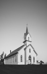 A black and white photo of a church
