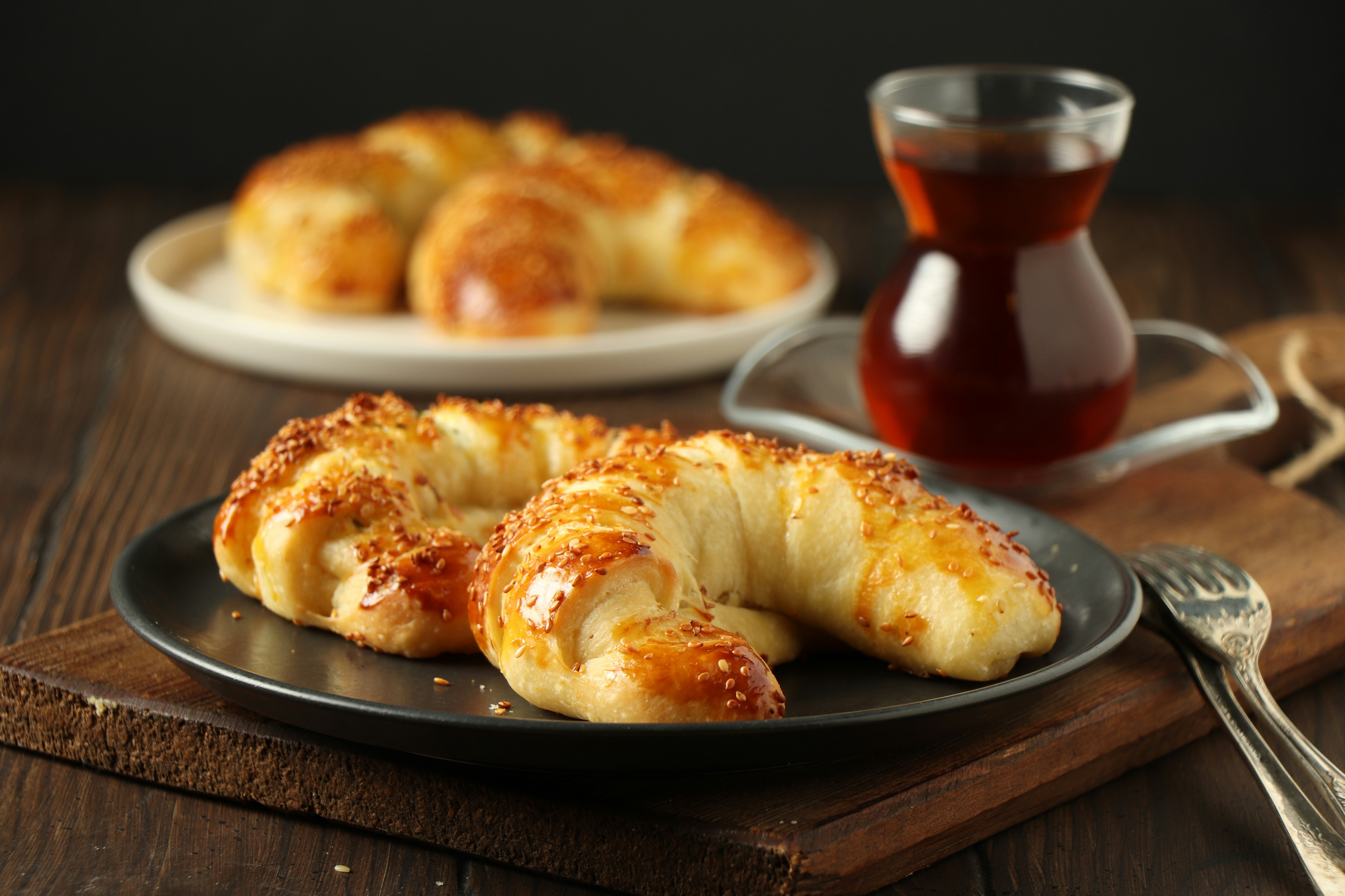 A plate of pastries on a wooden table
