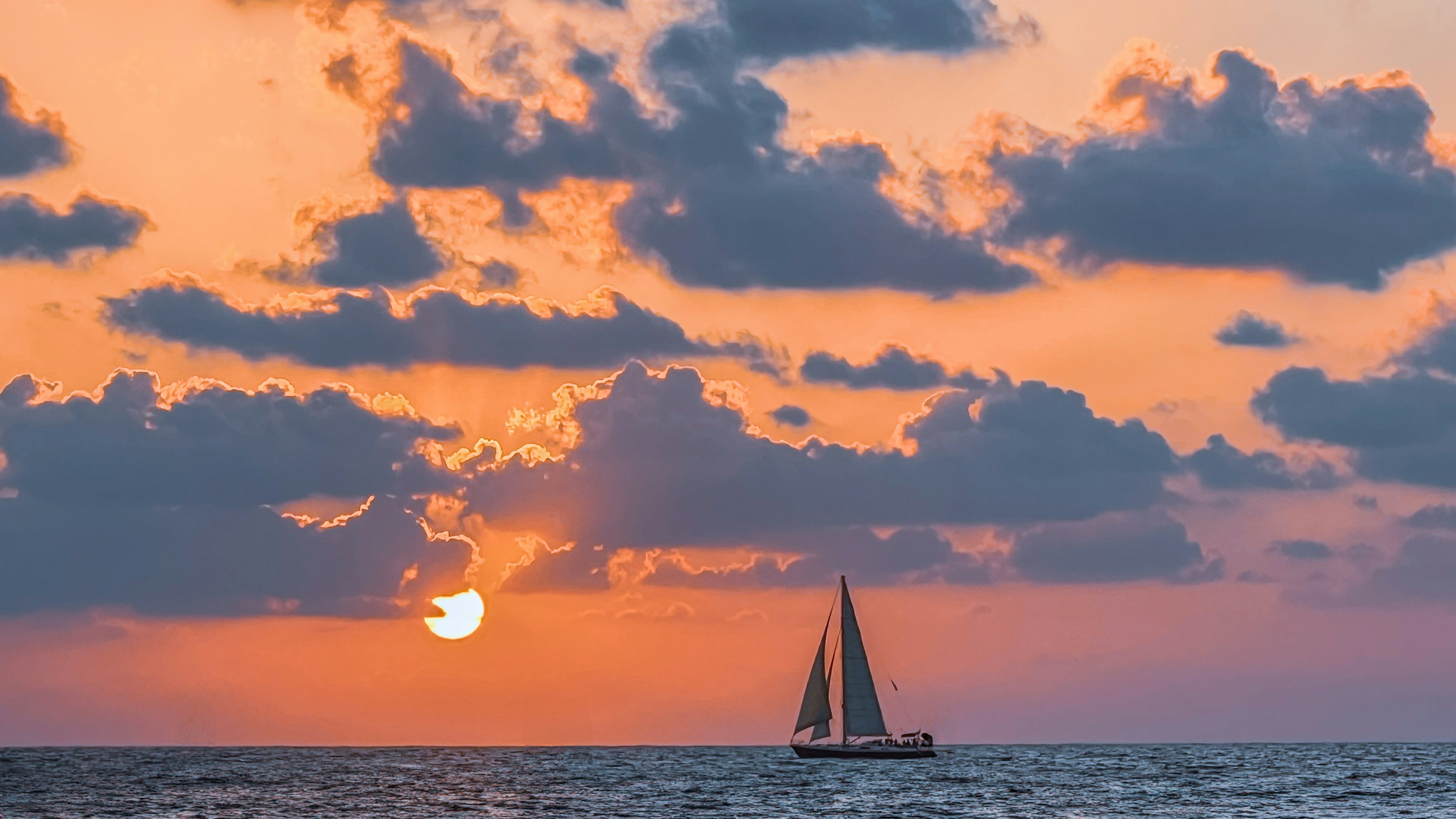 Mediterranean sunset sailboat