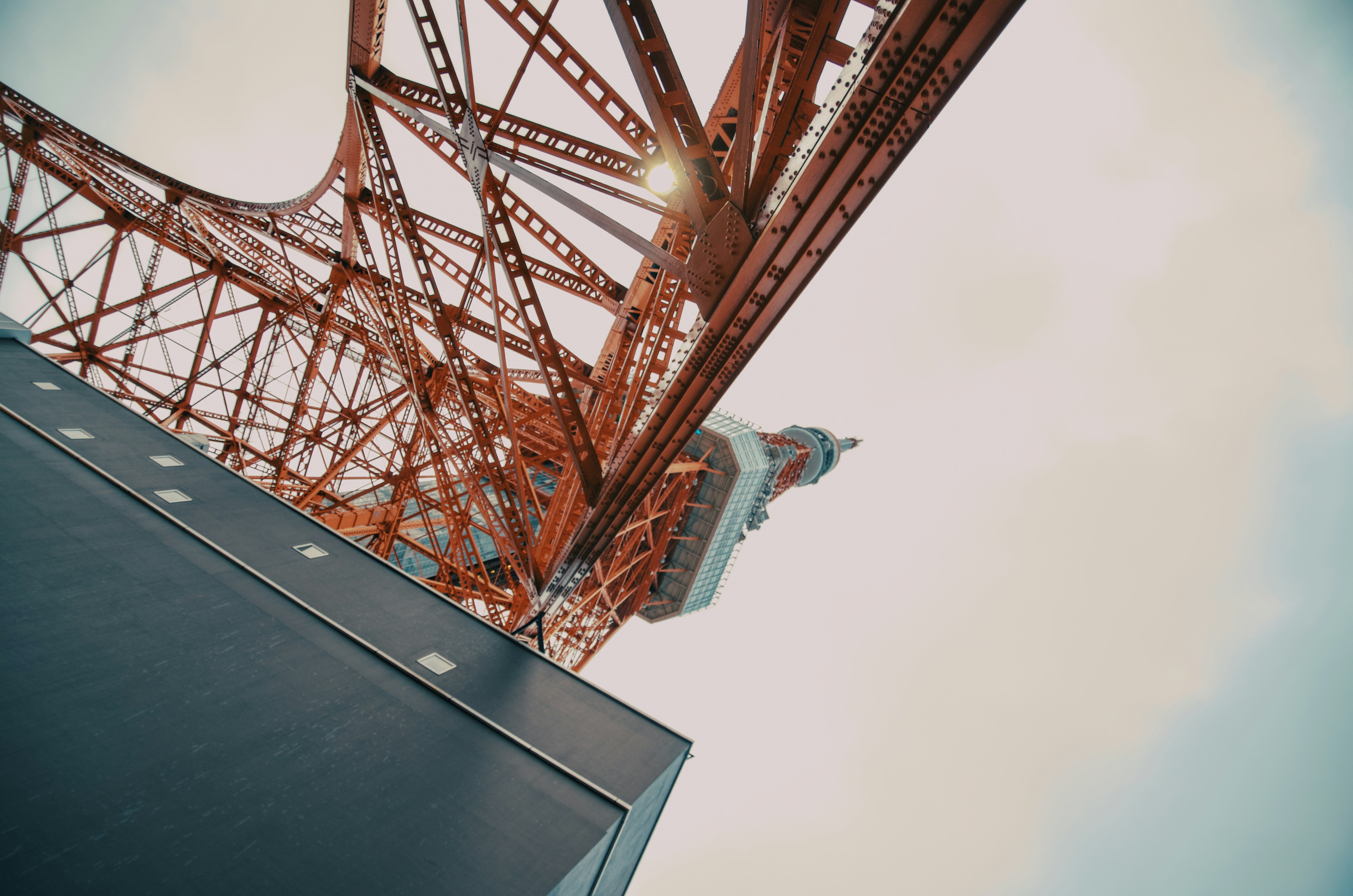 A tall tower with a sky in the background