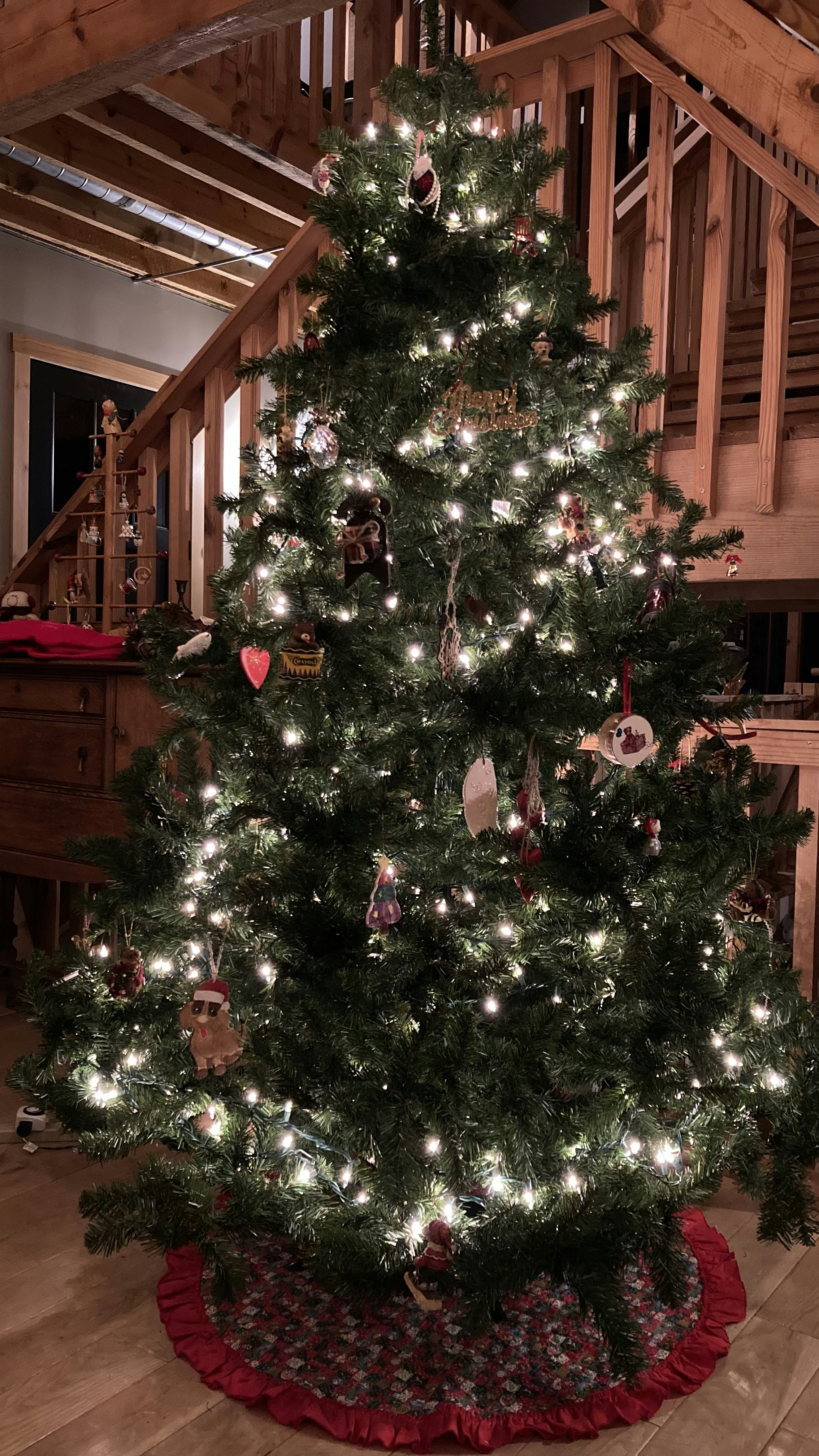 Beautiful home decorated with professional Christmas lights at twilight