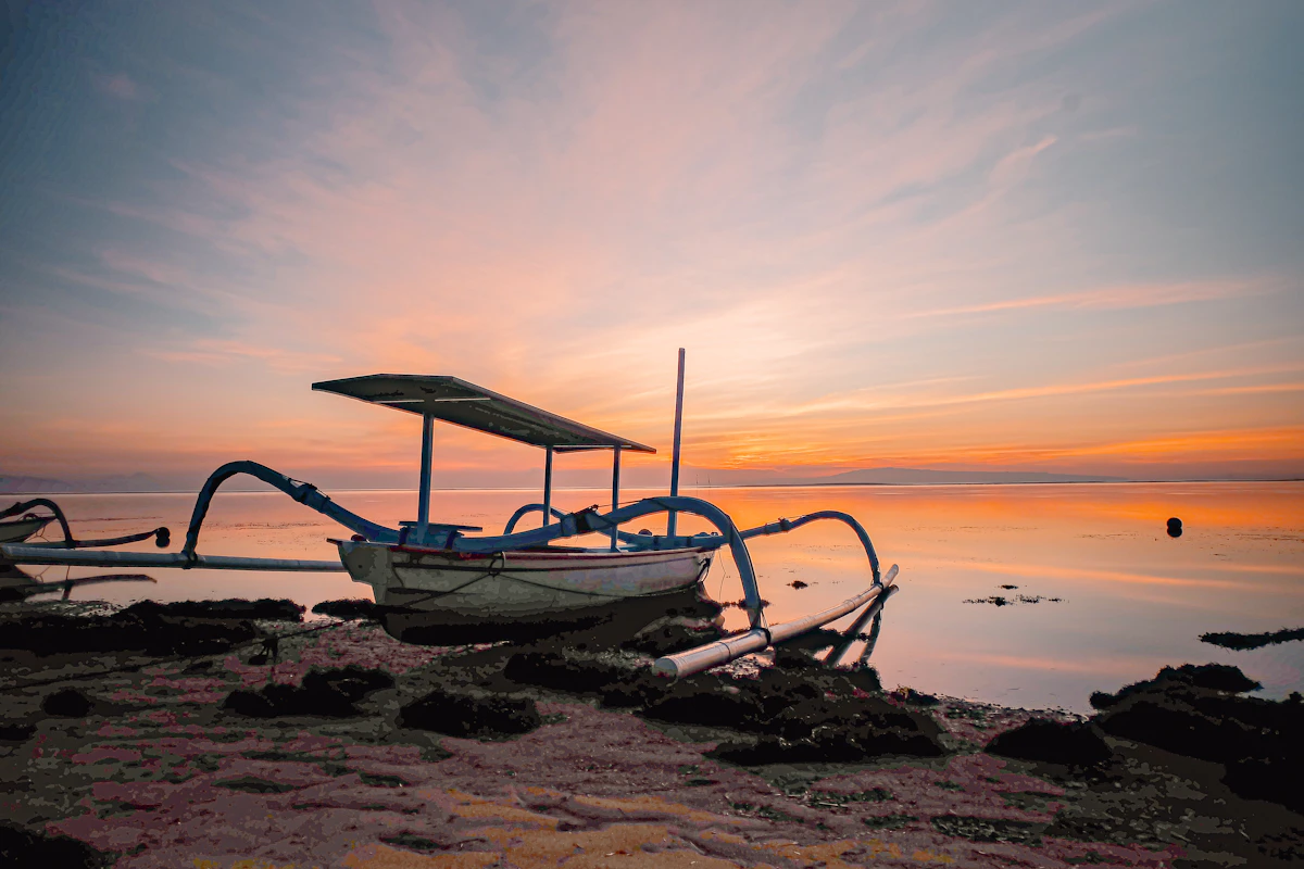 Peaceful sunrise bicycle boardwalk and calm barrier reef shallows in Sanur