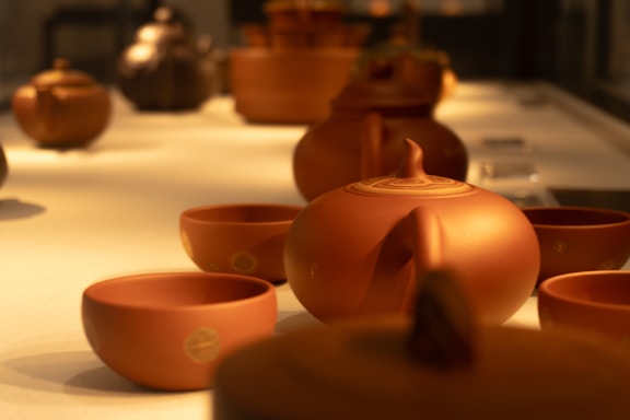 A group of clay pots sitting on top of a counter