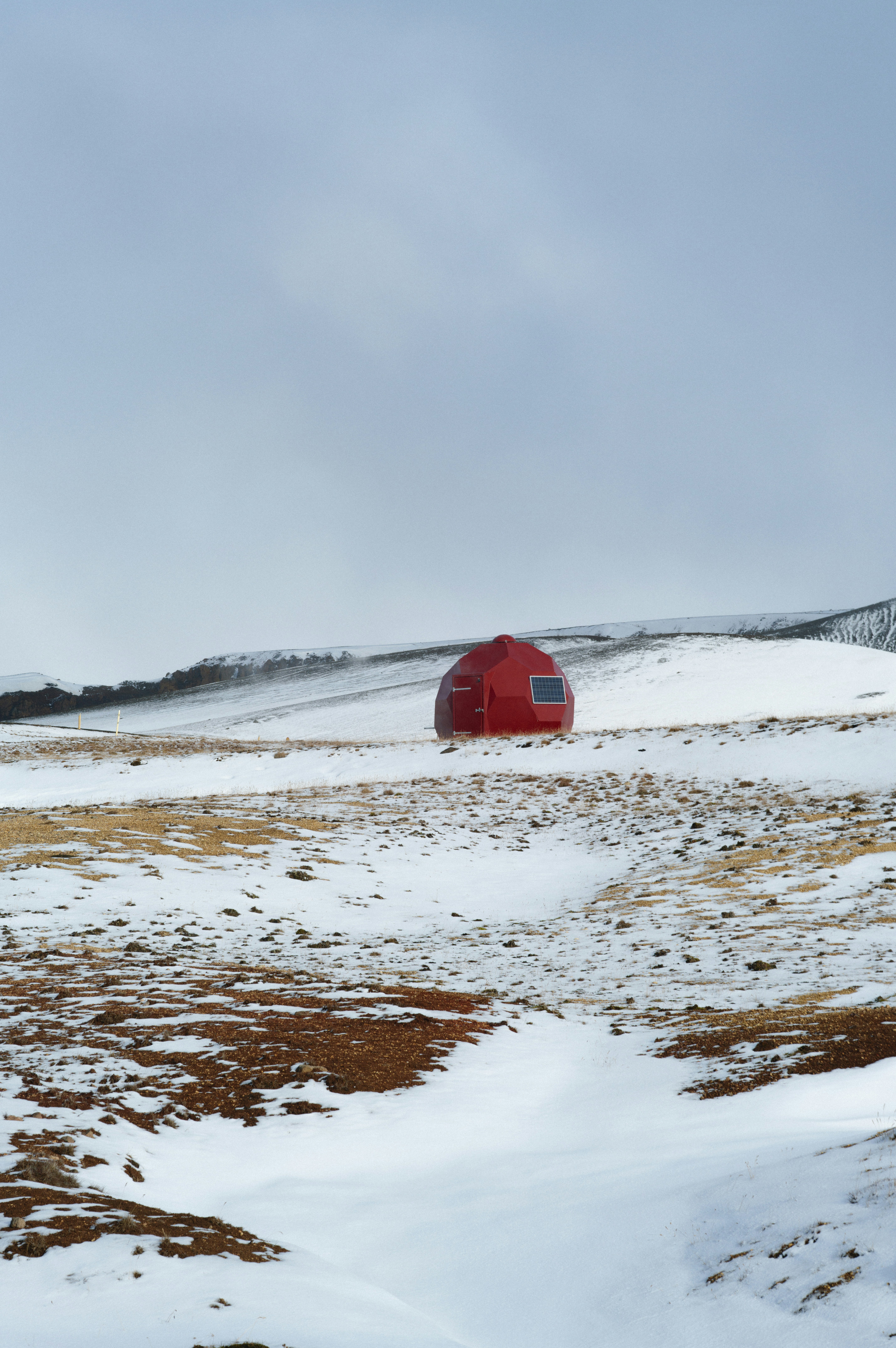 A red barn in the middle of a snowy field photo – Free Land Image on ...