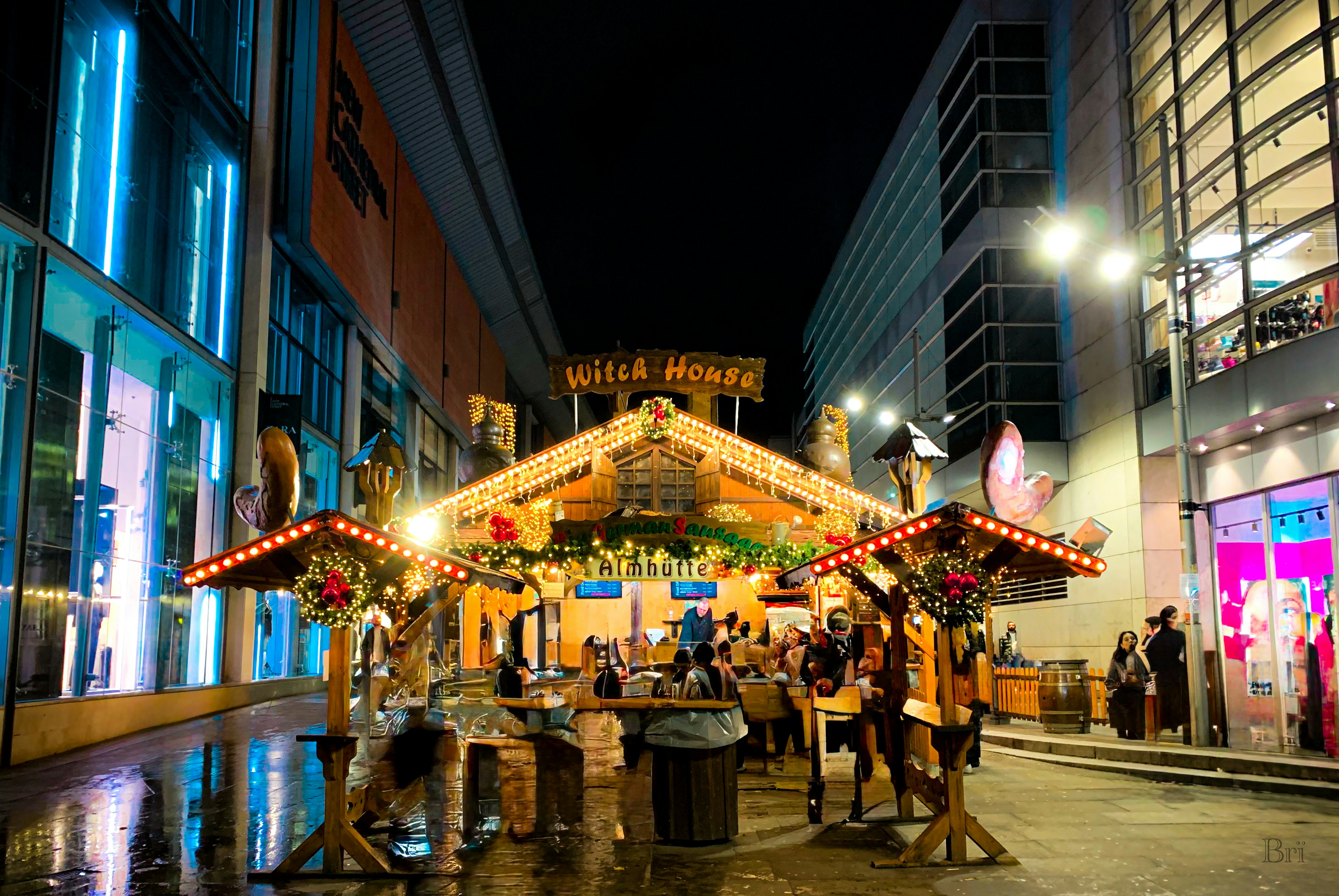 A merry go round in the middle of a city street