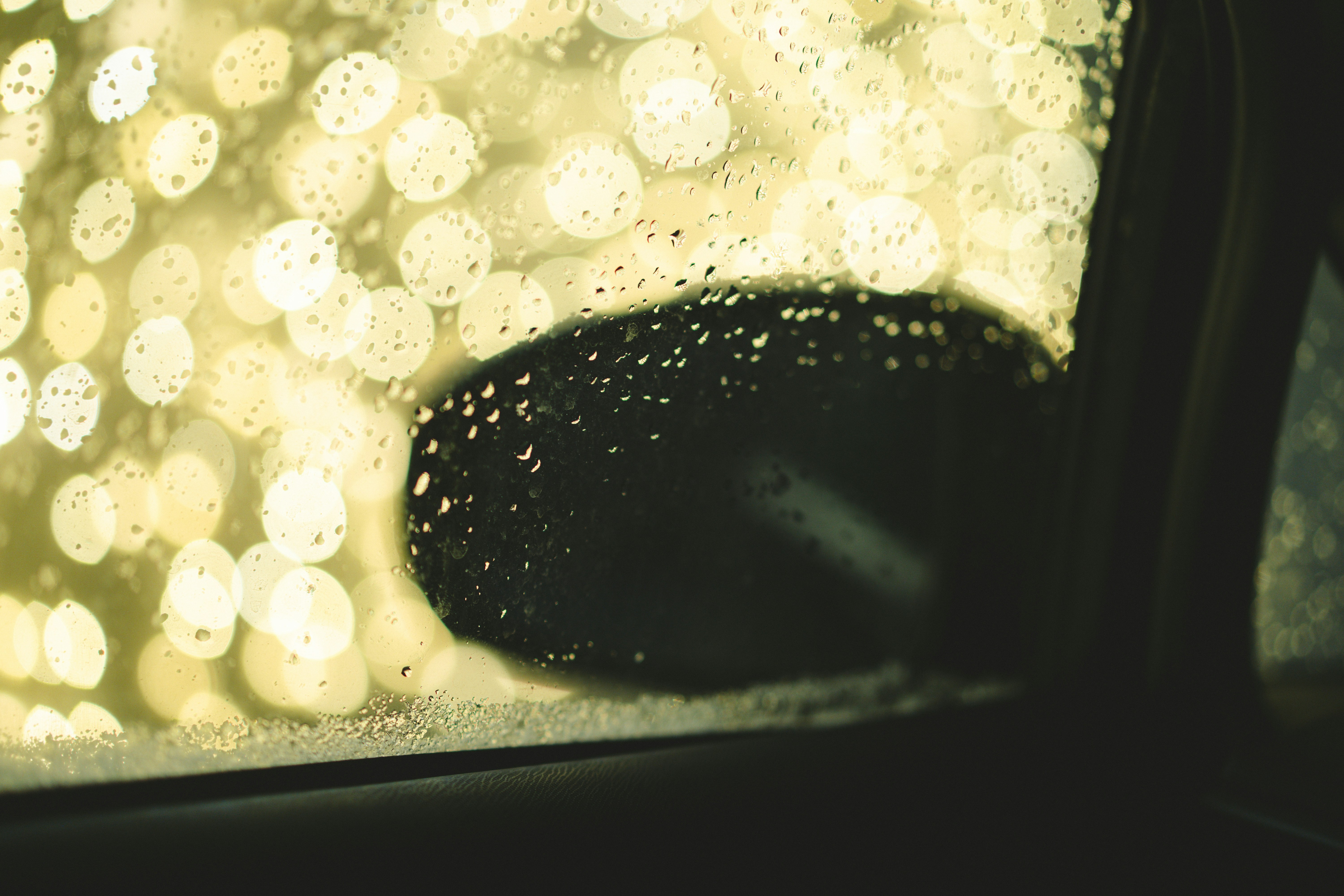 A close up of a car's rear view mirror