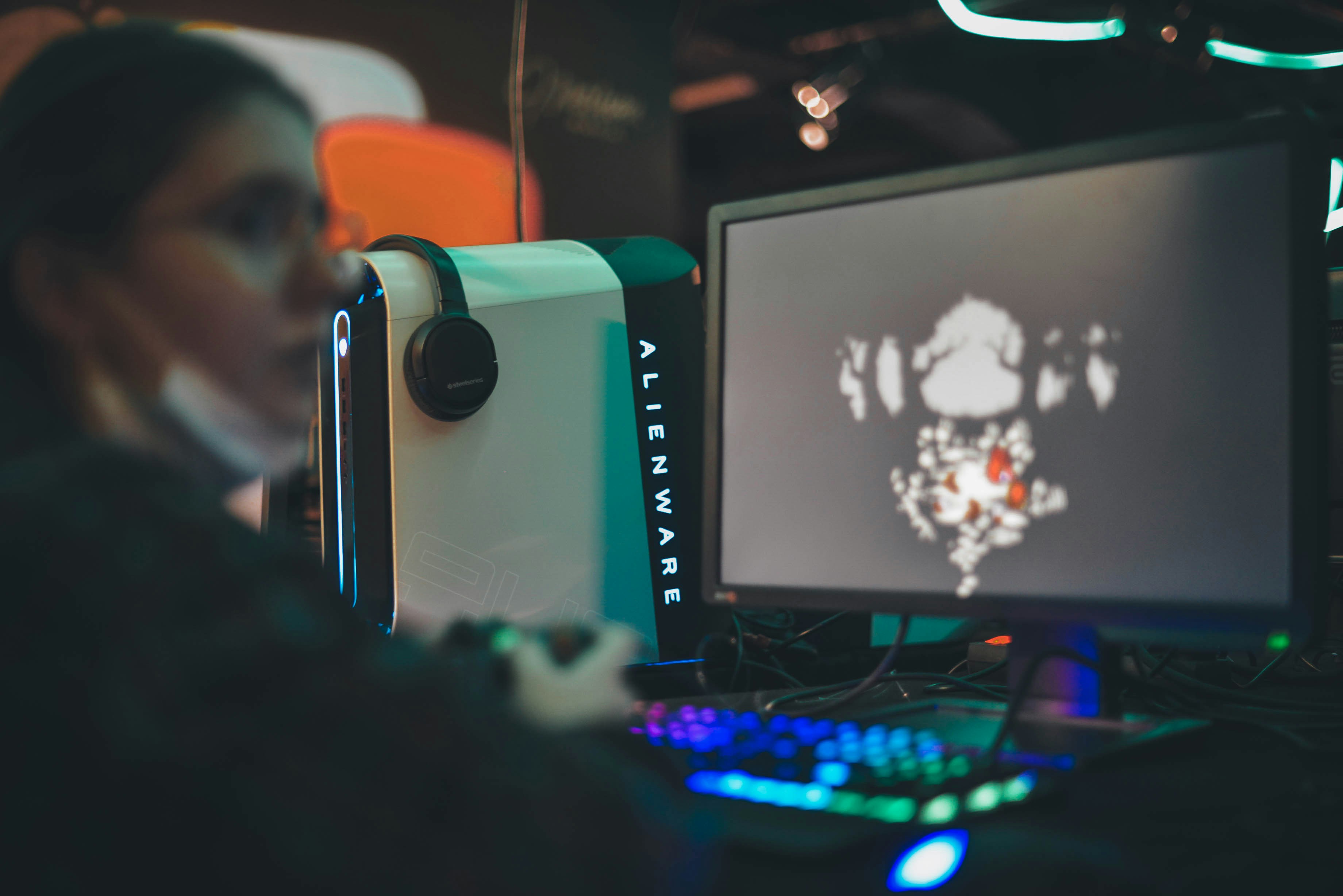 A person sitting in front of a computer