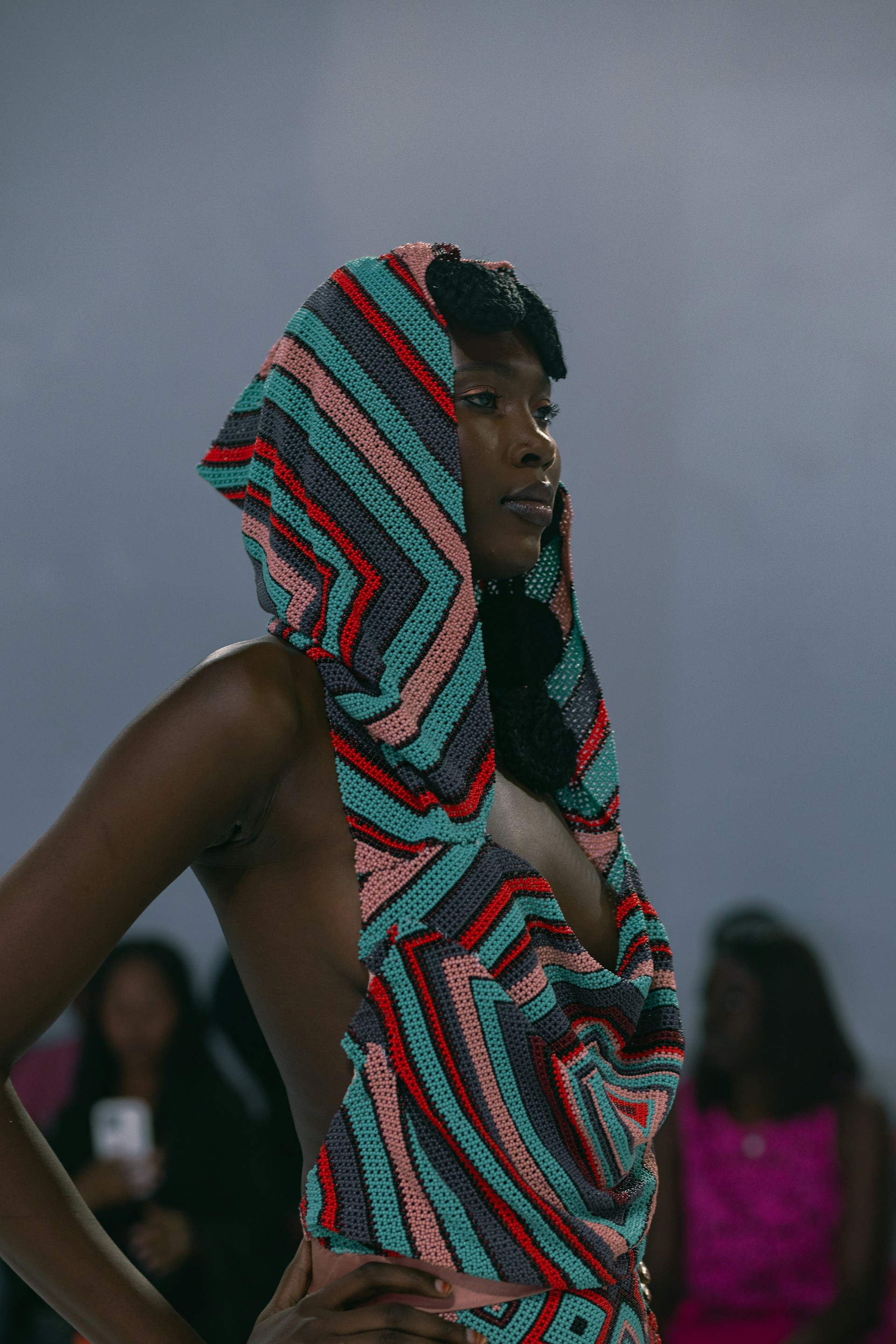 A woman with a colorful towel on her head