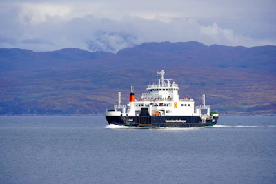 A large boat traveling across a large body of water