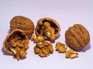 A bunch of walnuts sitting on top of a table