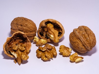 A bunch of walnuts sitting on top of a table