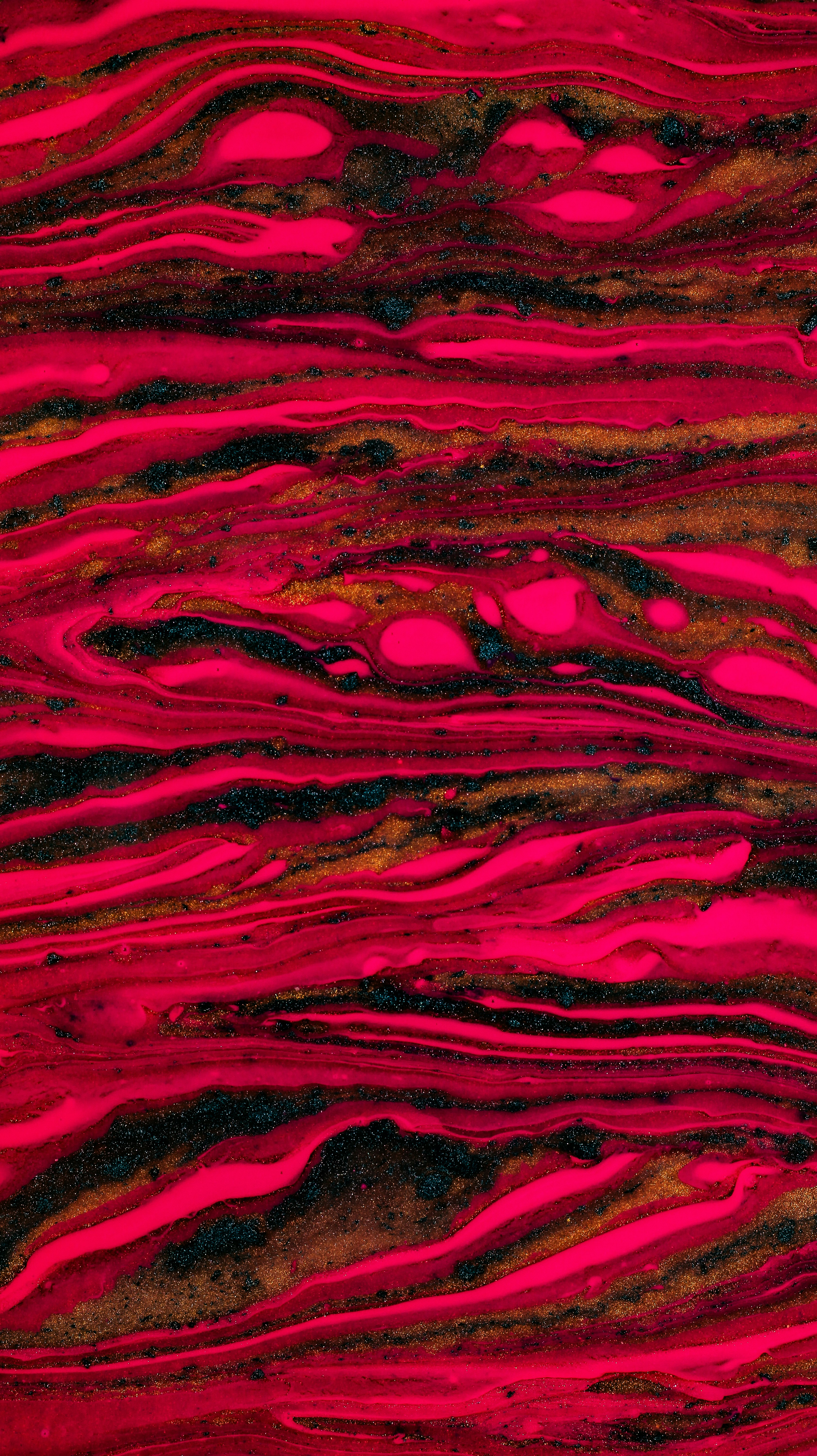 A red and black background with lots of different colors