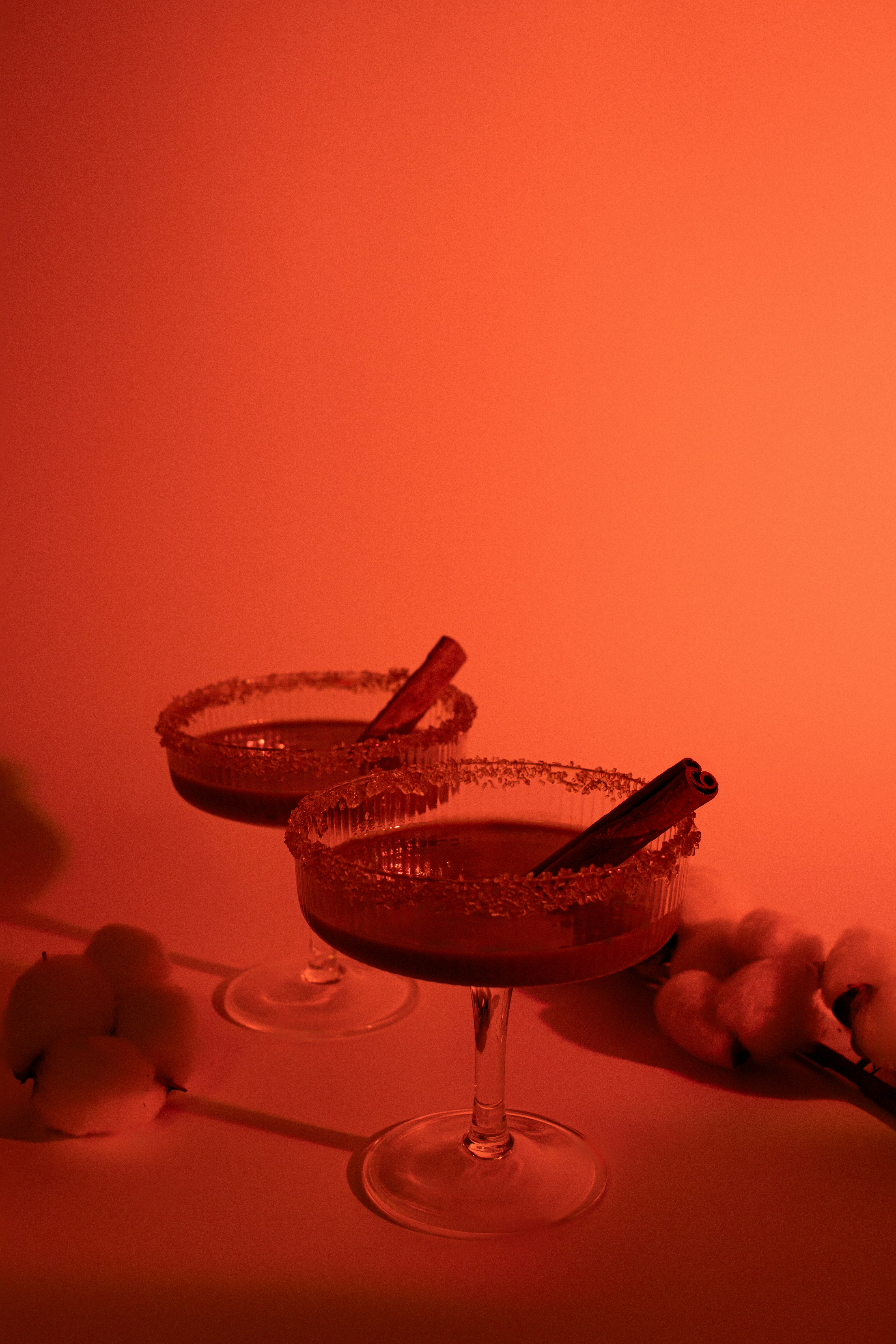 A couple of glasses that are sitting on a table