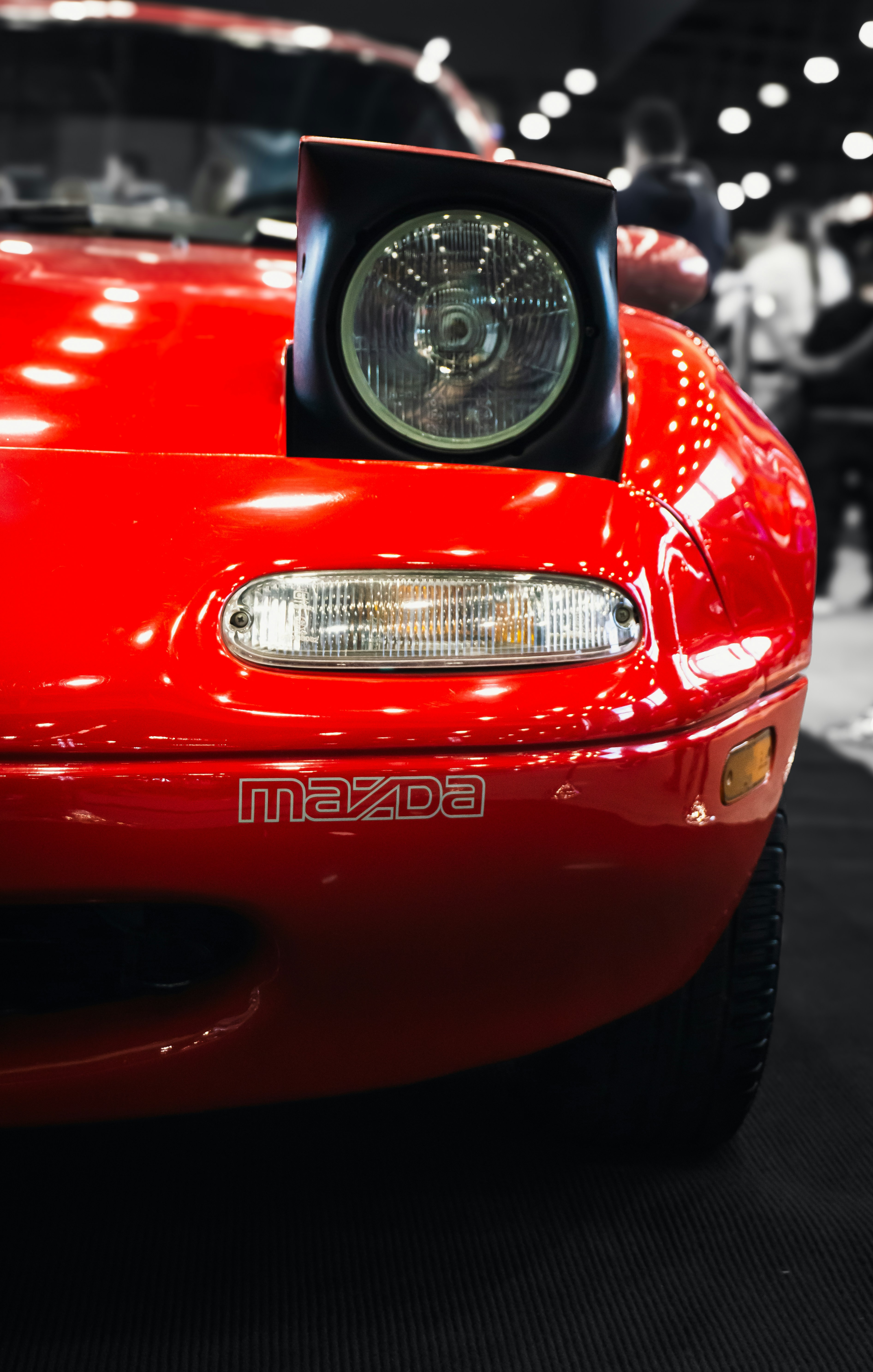 A close up of a red sports car