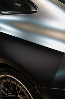 A close up of a shiny silver car