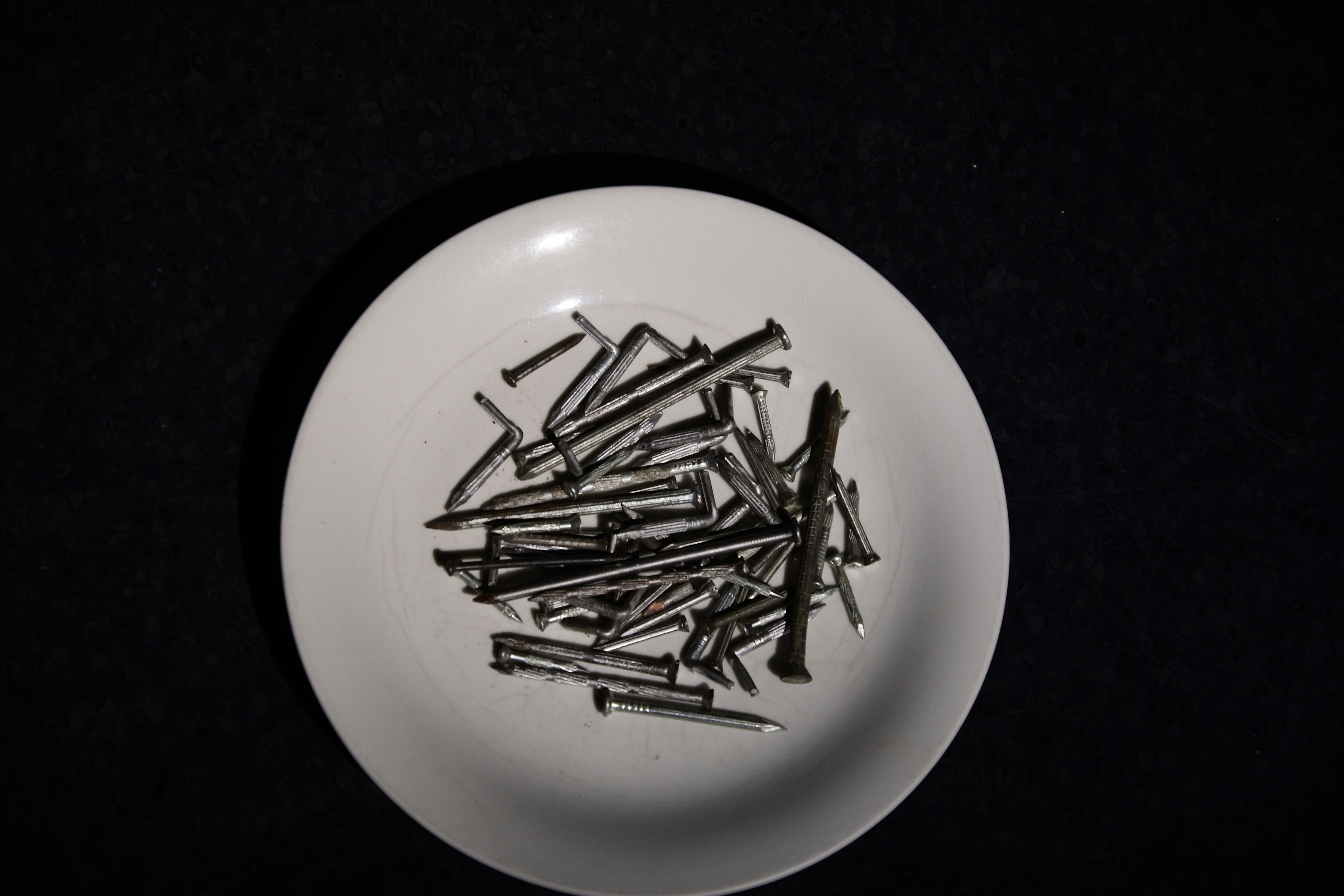 Custom nails and accessories on white plate