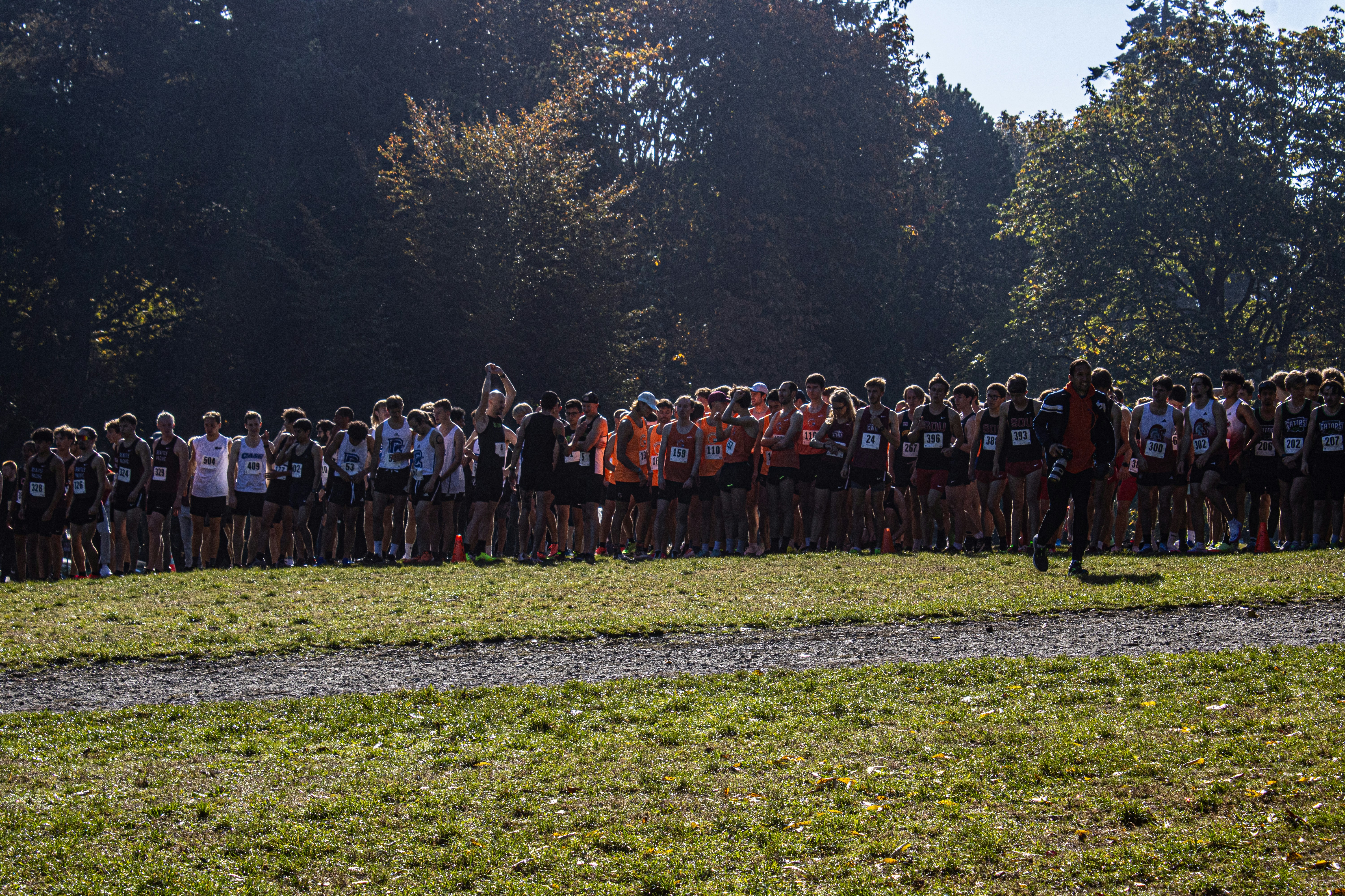A large group of people standing in a field