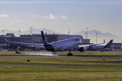 A large jetliner taking off from an airport runway