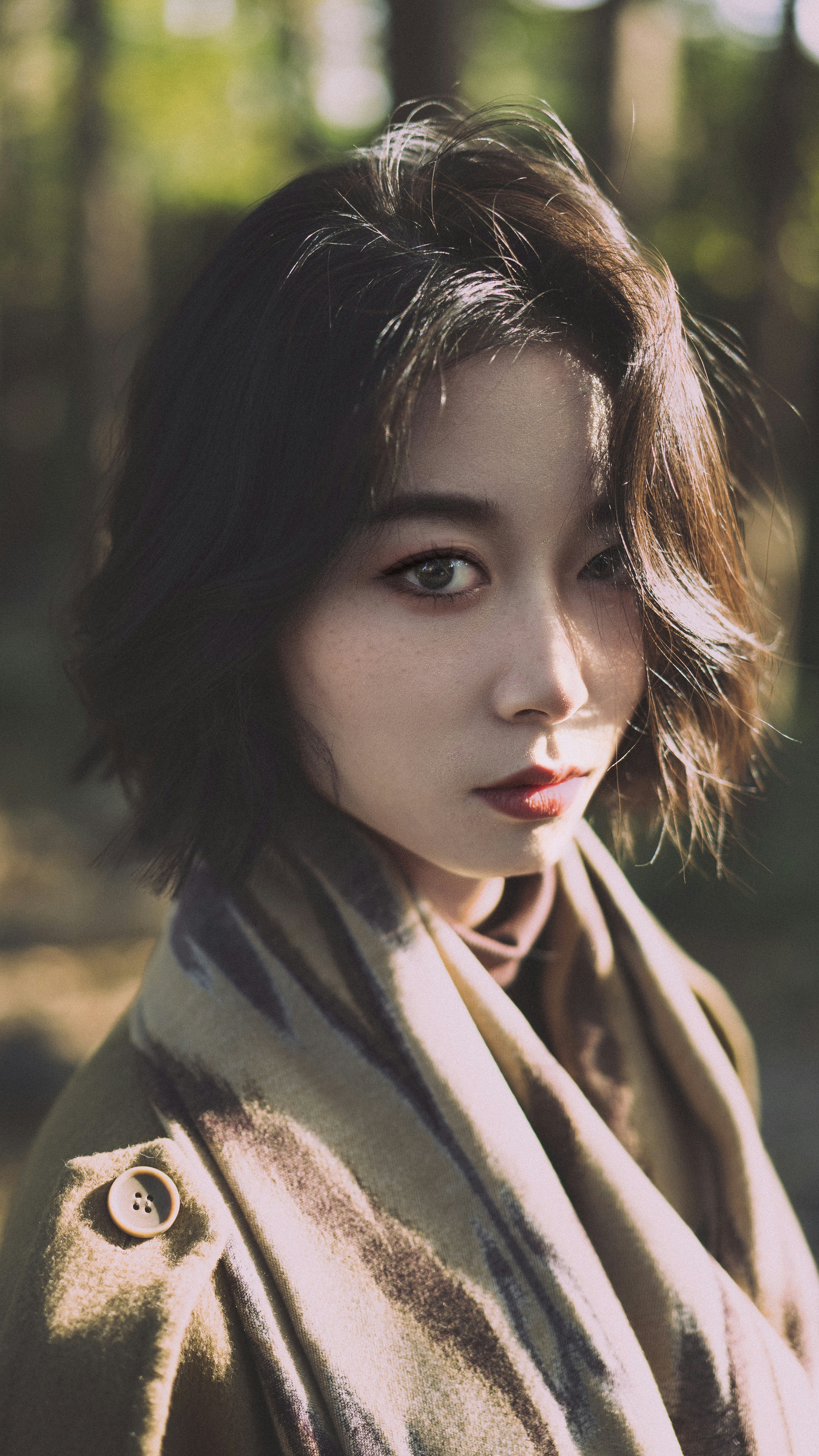 A woman with a scarf around her neck photo – Free Face Image on Unsplash