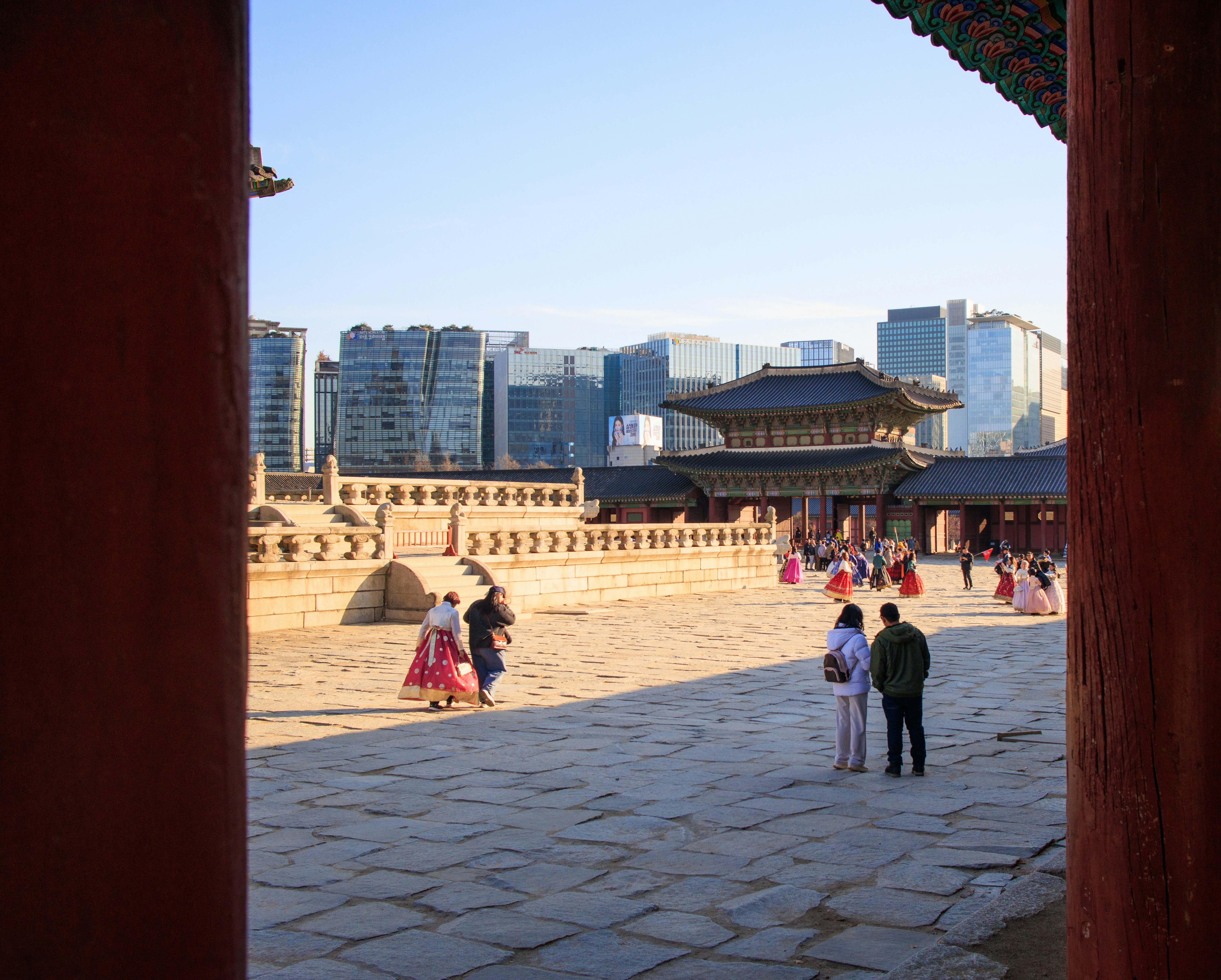 A group of people standing around a courtyard