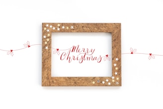 A picture frame with a merry christmas message on it