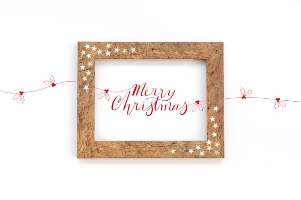 A picture frame with a merry christmas message on it