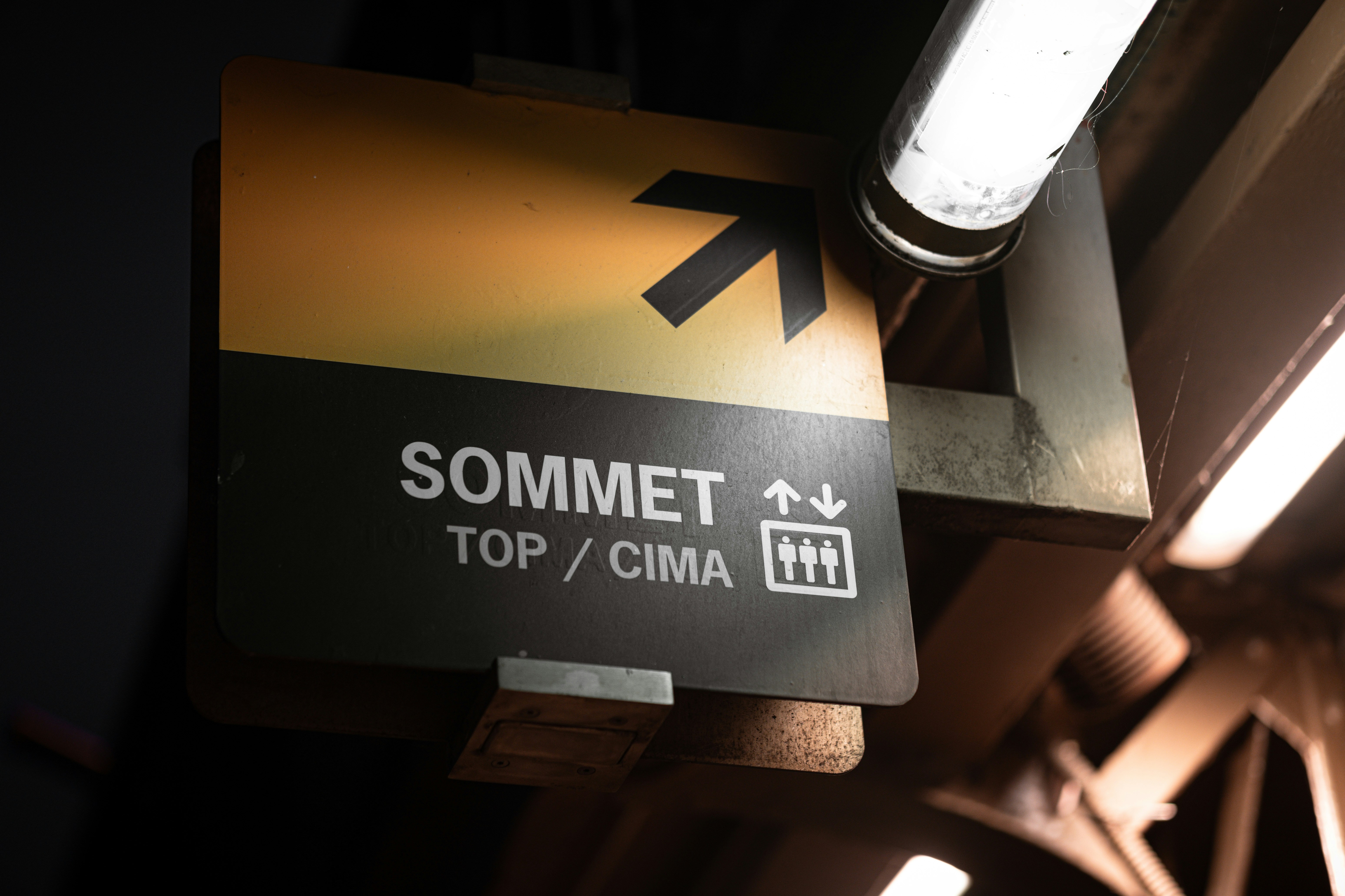 A close up of a street sign on a pole