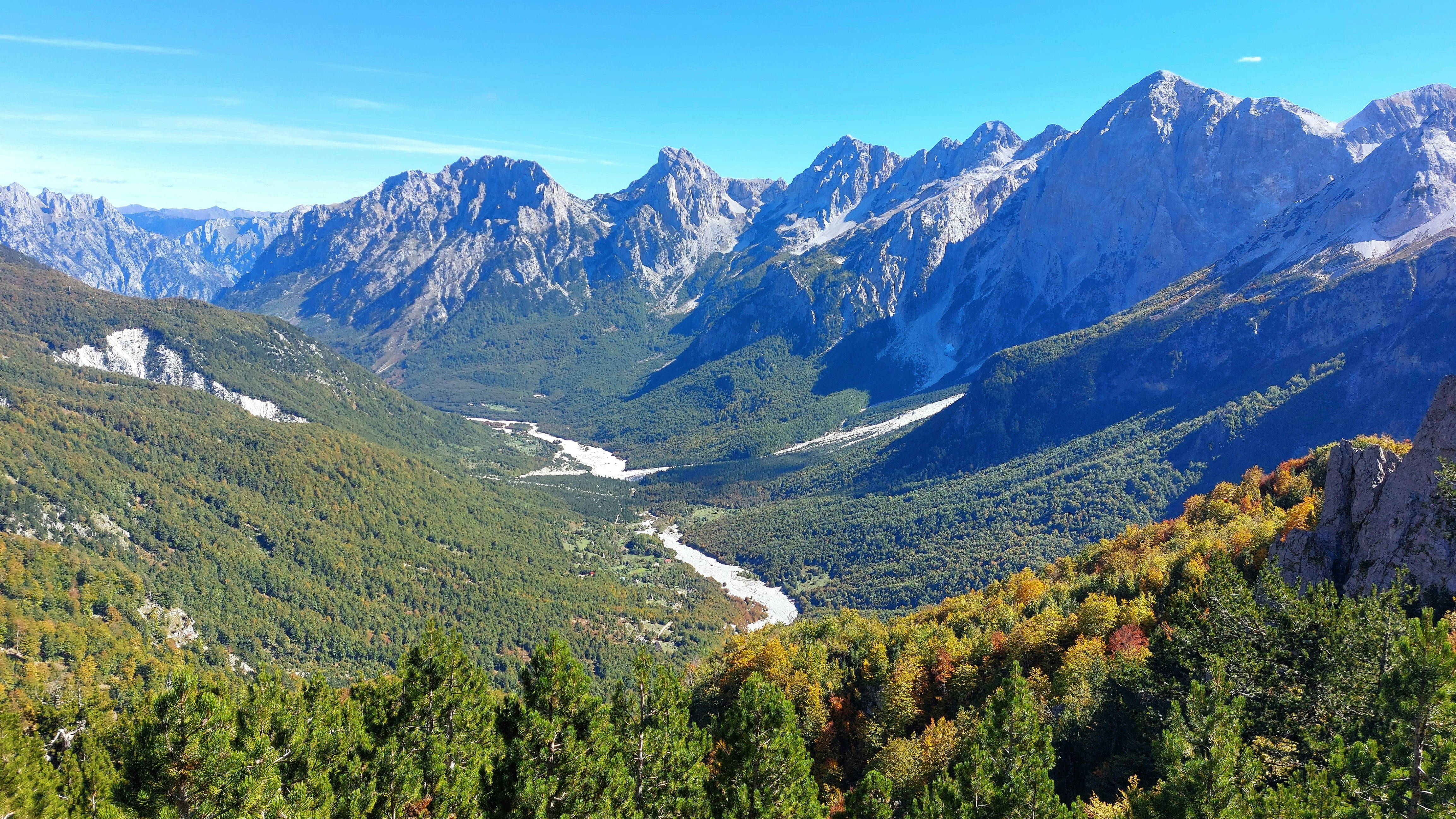Stunning view of mountain peaks and lush valleys in Theth, part of the Albanian Alps