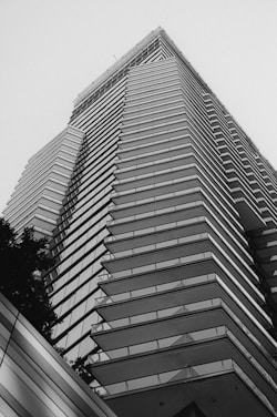 A black and white photo of a tall building