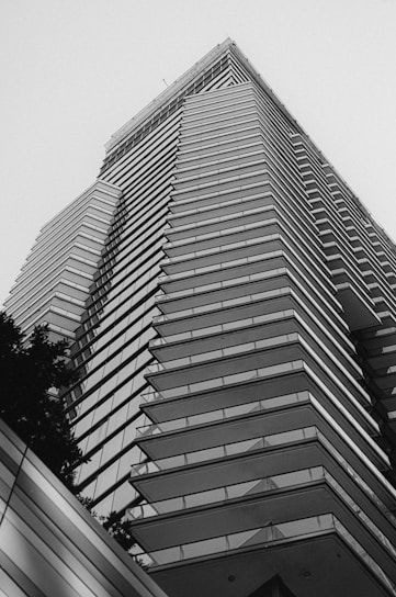 A black and white photo of a tall building