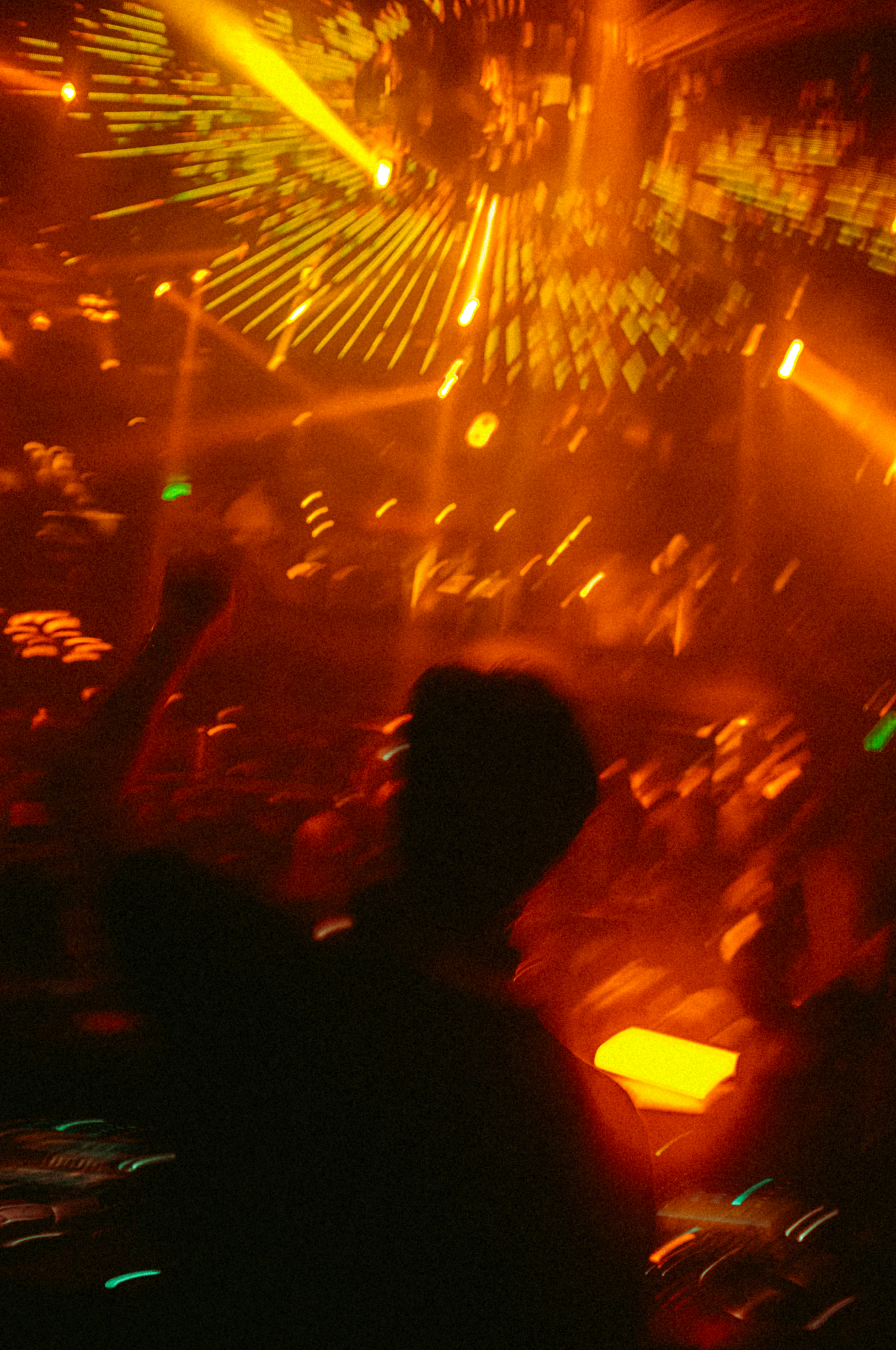 A man standing in front of a crowd at a concert