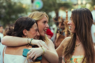 A group of women standing next to each other