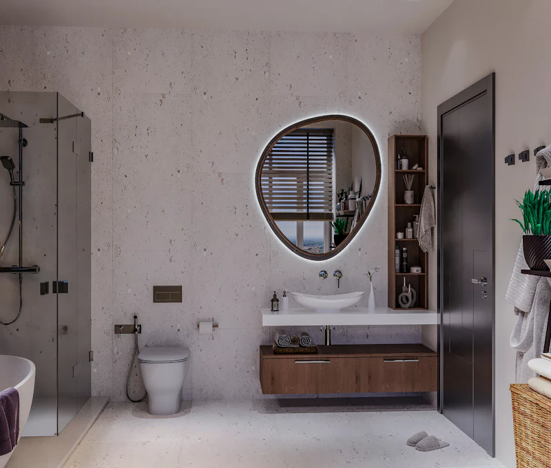 Mueble compacto con espejo orgánico