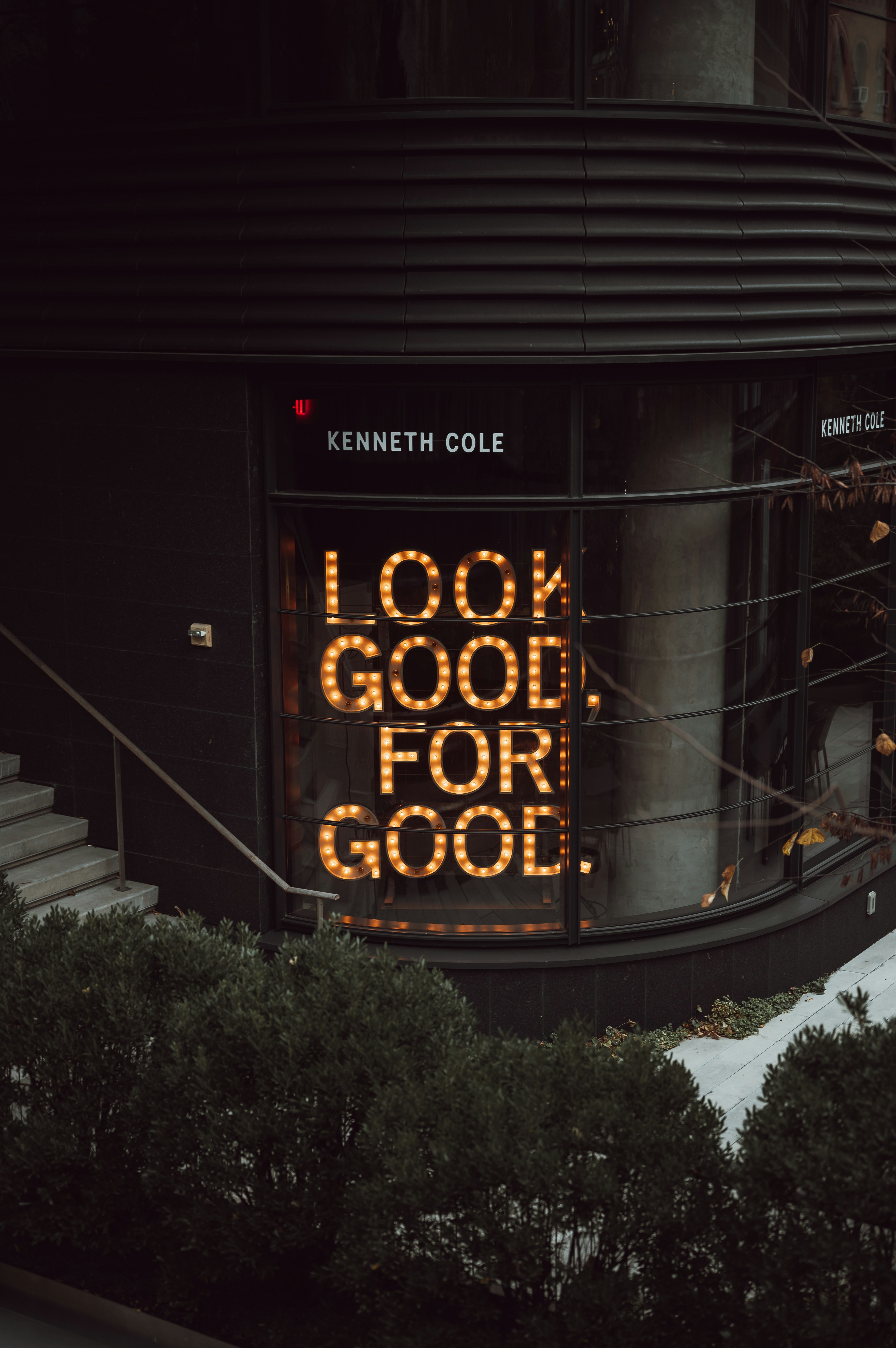 A sign that reads look good for good on a building