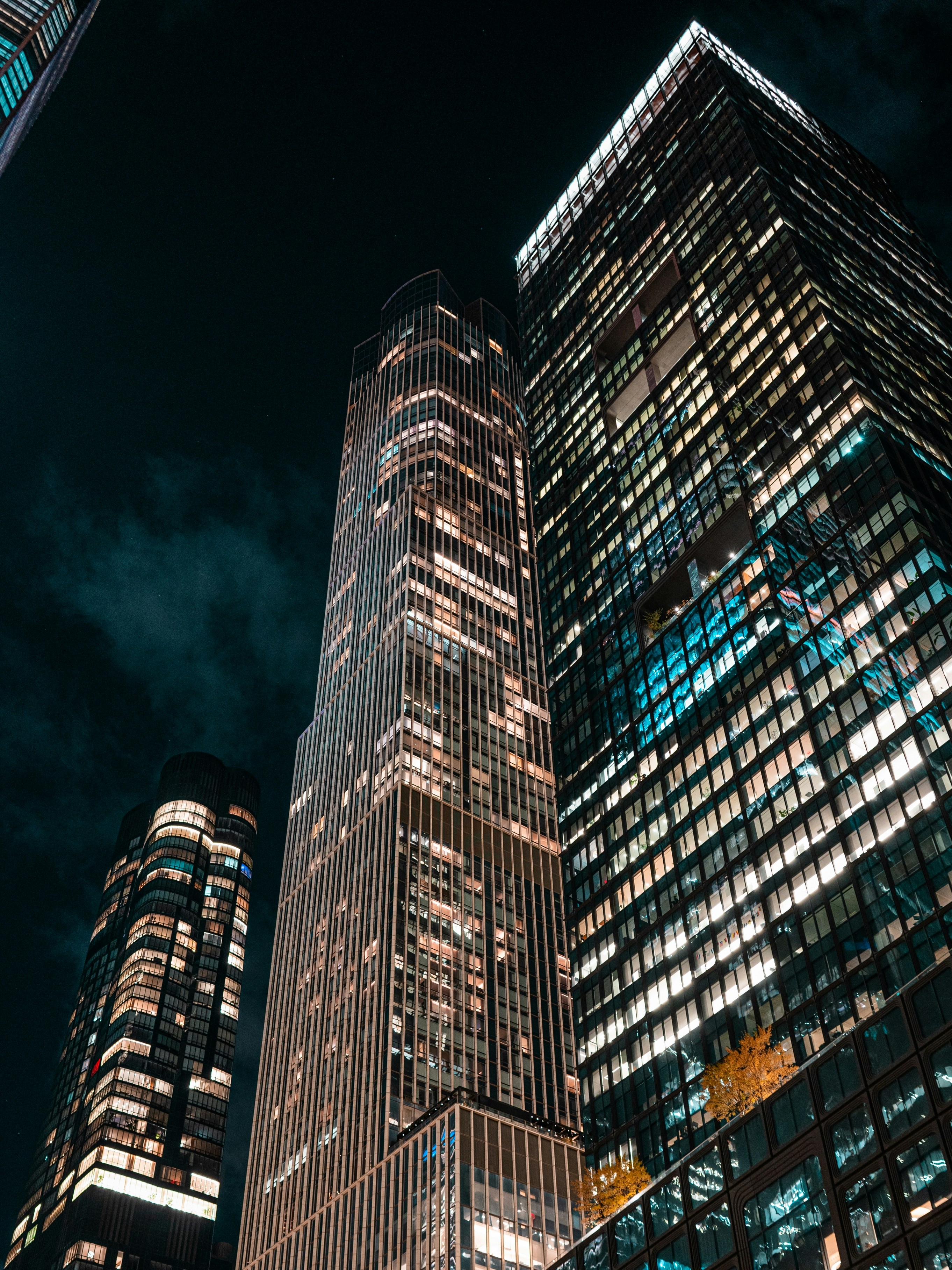 A very tall building lit up at night