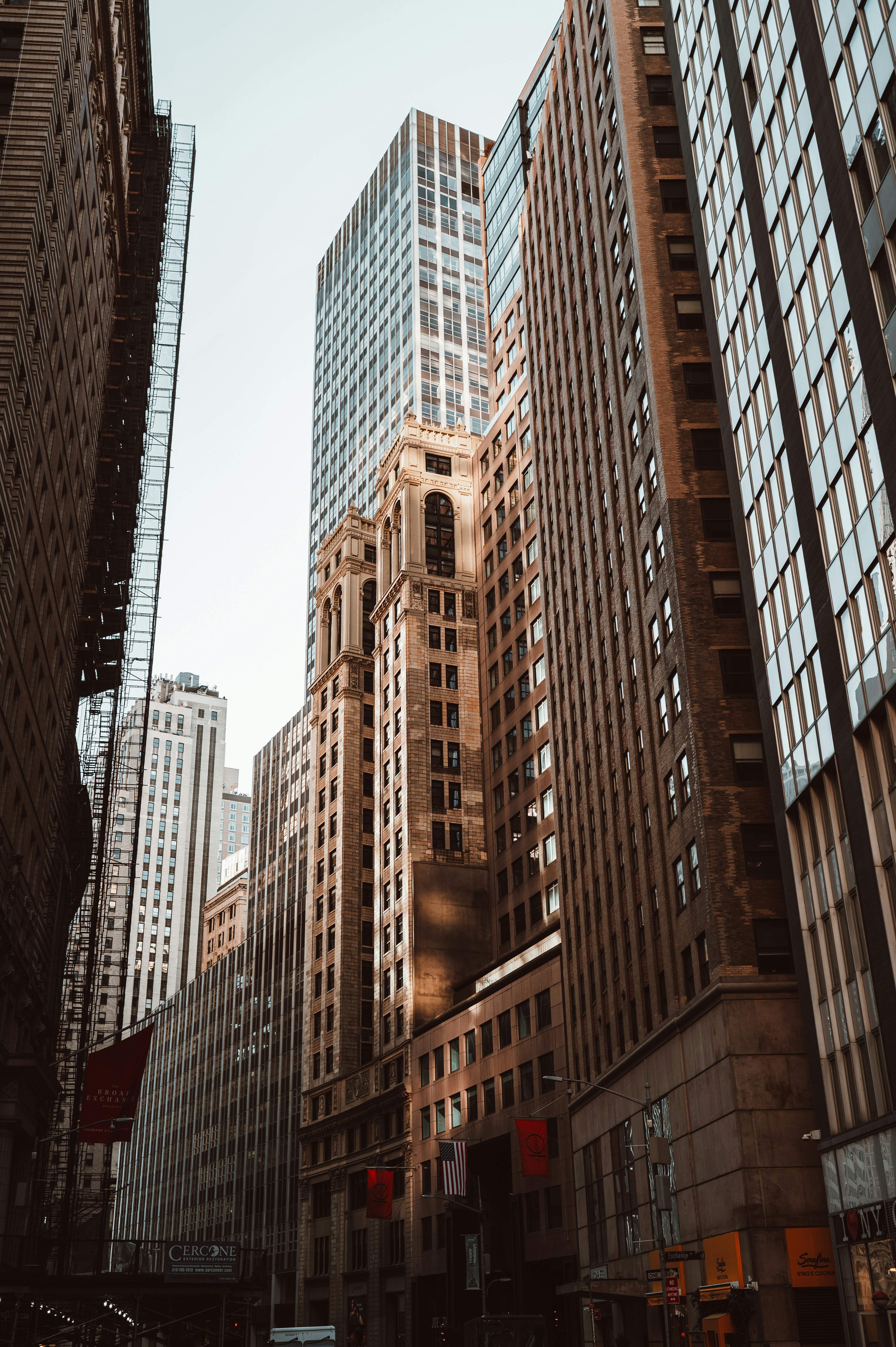 A city street filled with lots of tall buildings