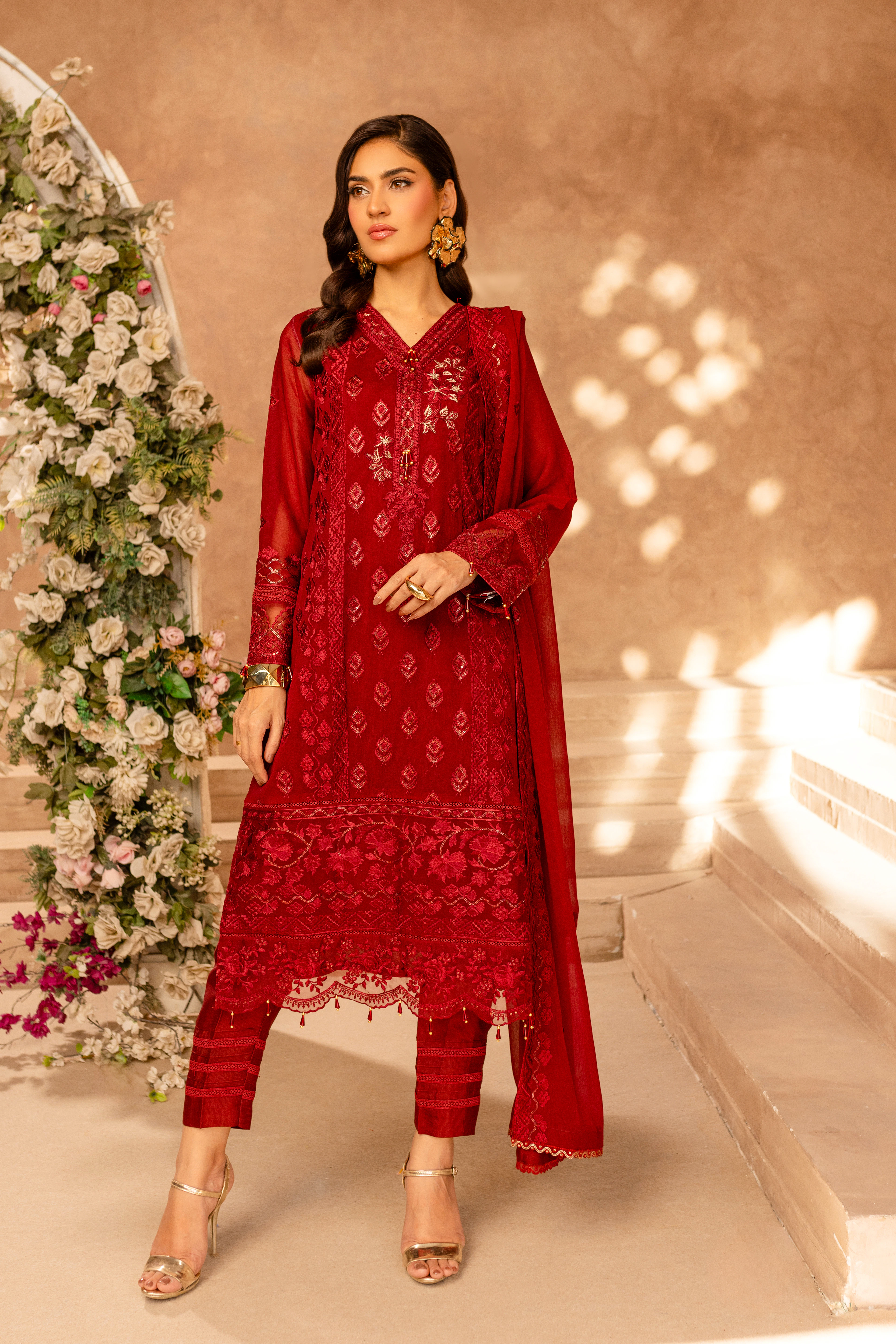 A crimson chikankari suit with matching dupatta