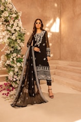 A woman in a black and white outfit