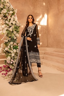 A woman in a black and white outfit