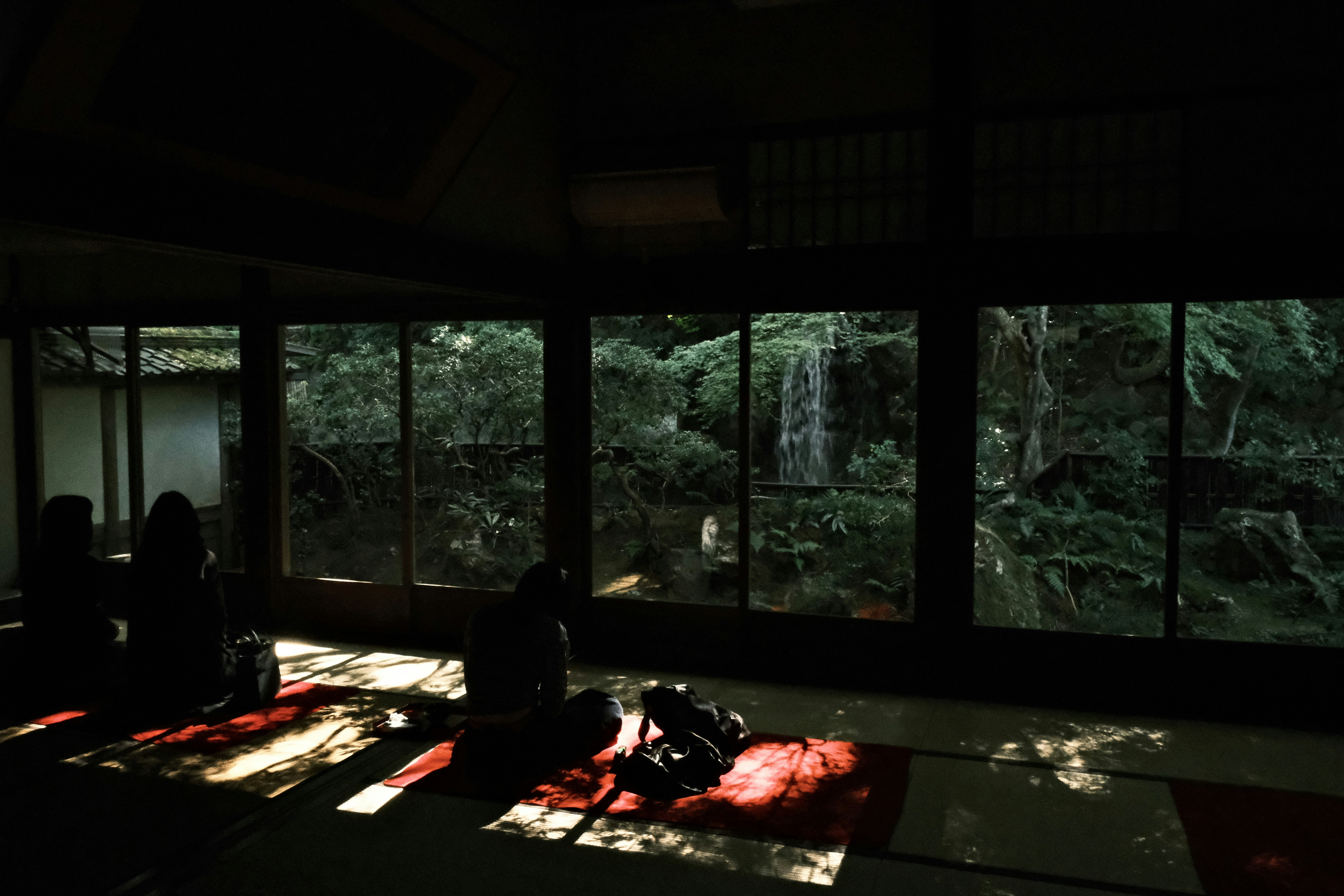 Interior of a warm, inviting Japanese ski resort restaurant with people dining