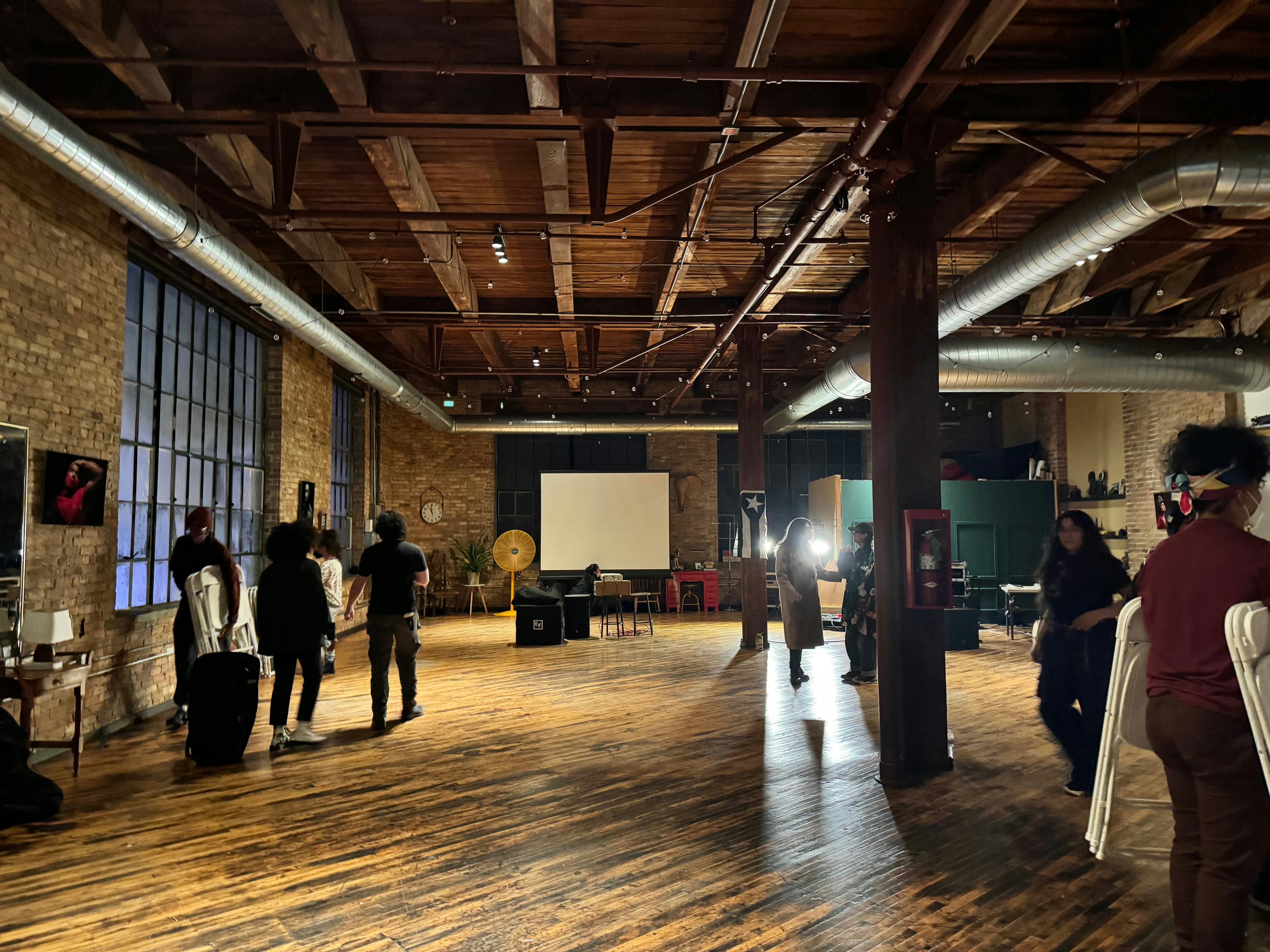 Group of people in large meeting room