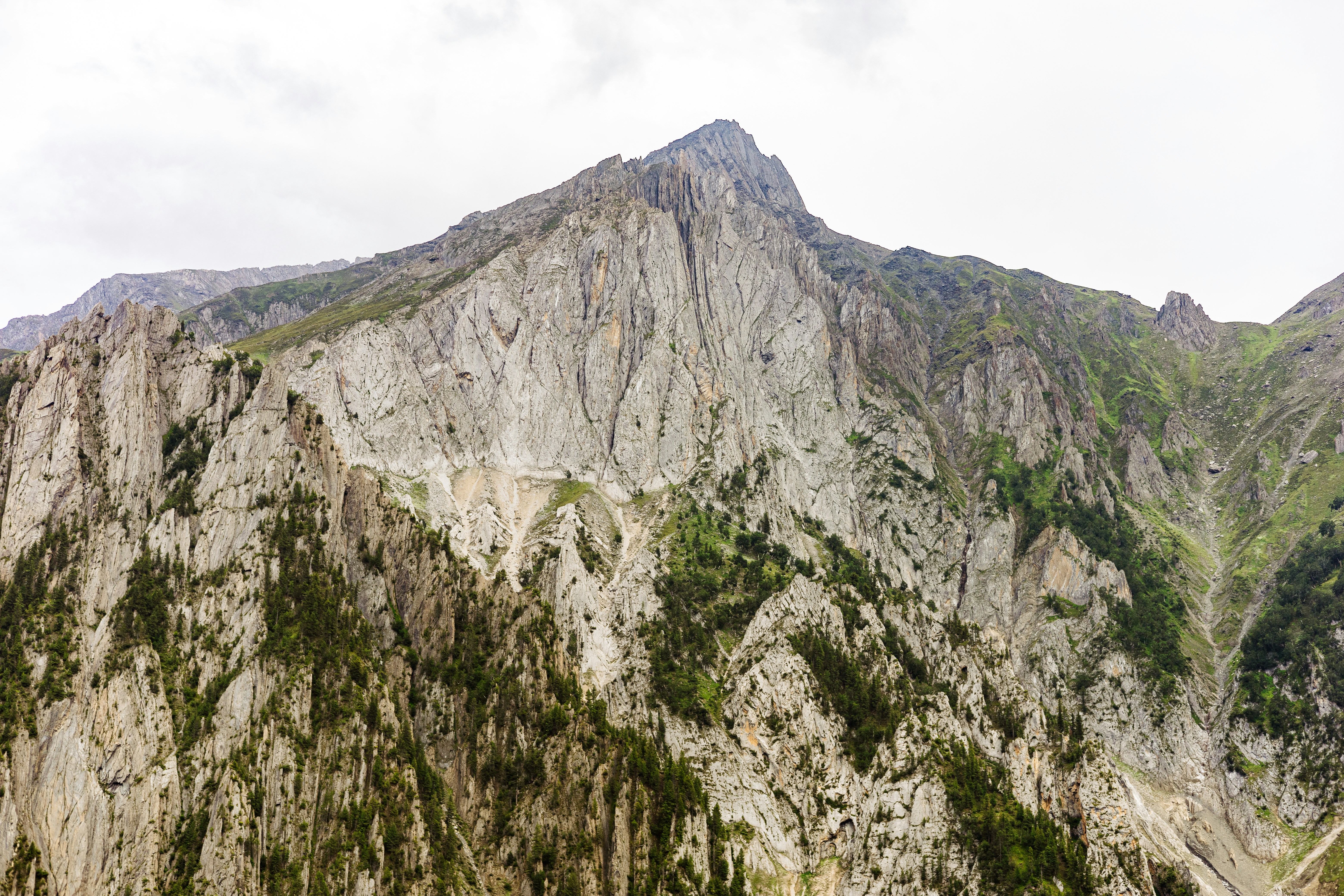 A group of people standing on top of a mountain