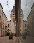 A view of a clock tower through a window