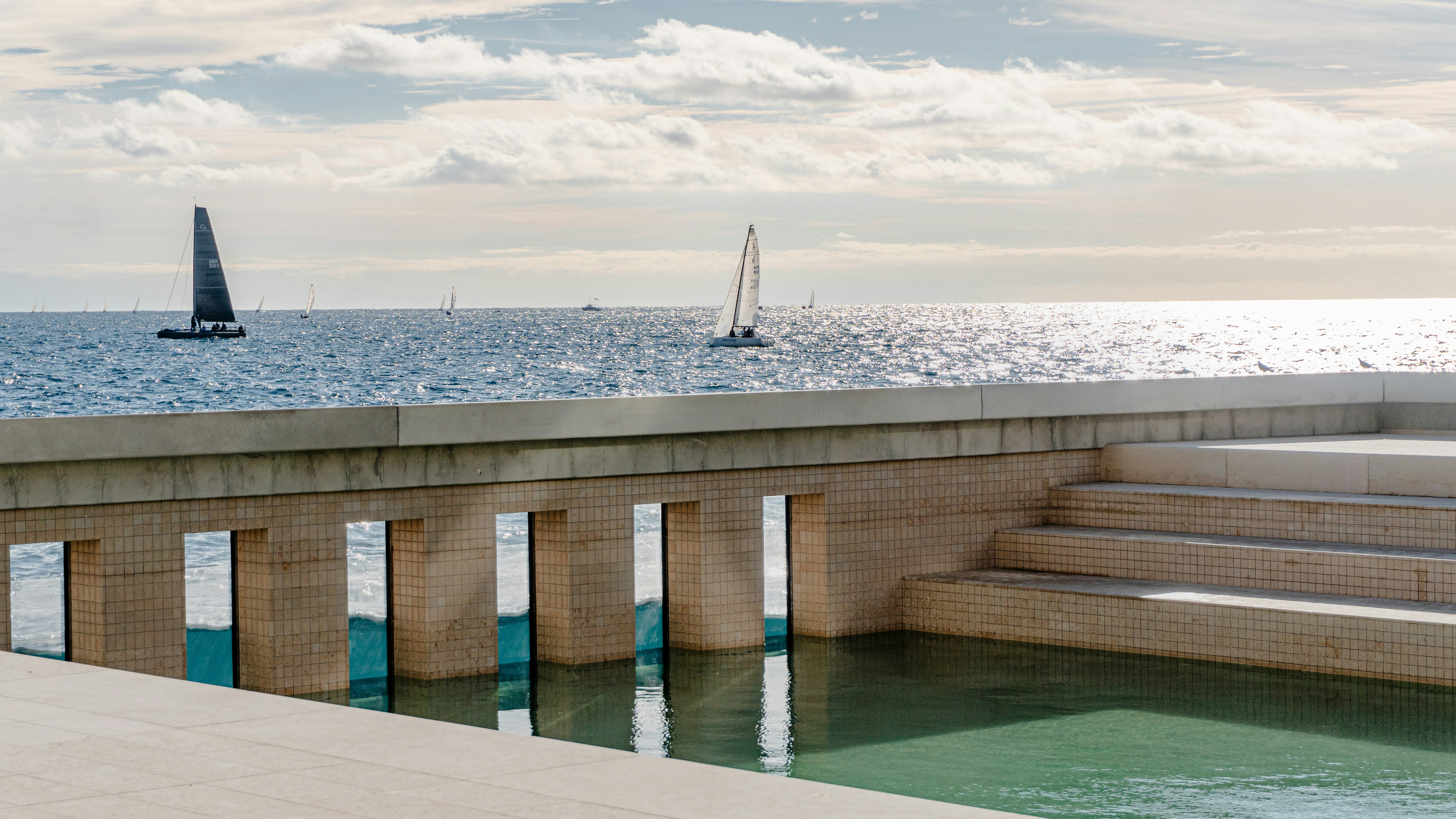 There is a small boat that is in the water